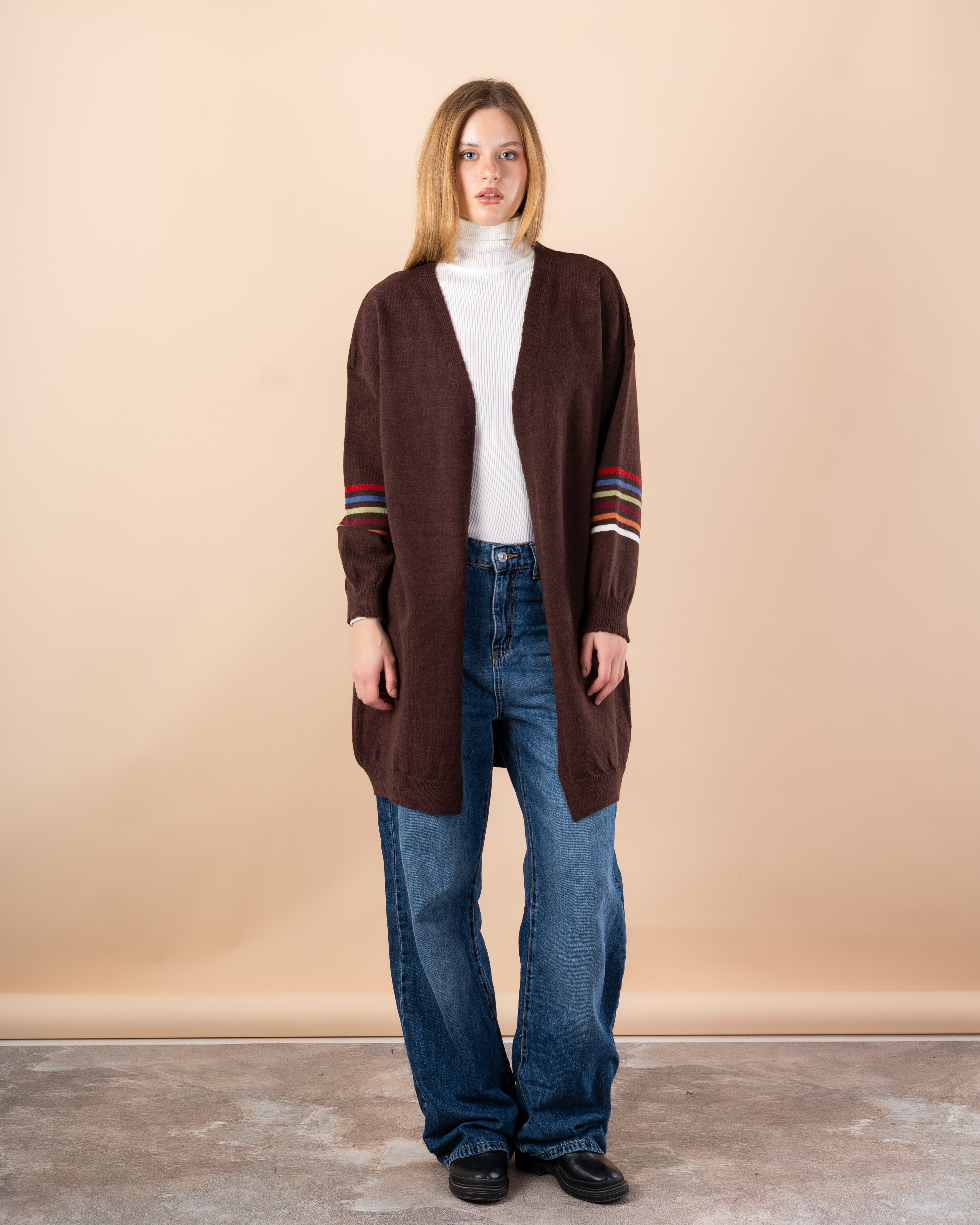 Knitted cardigan in - colors on the sleeves