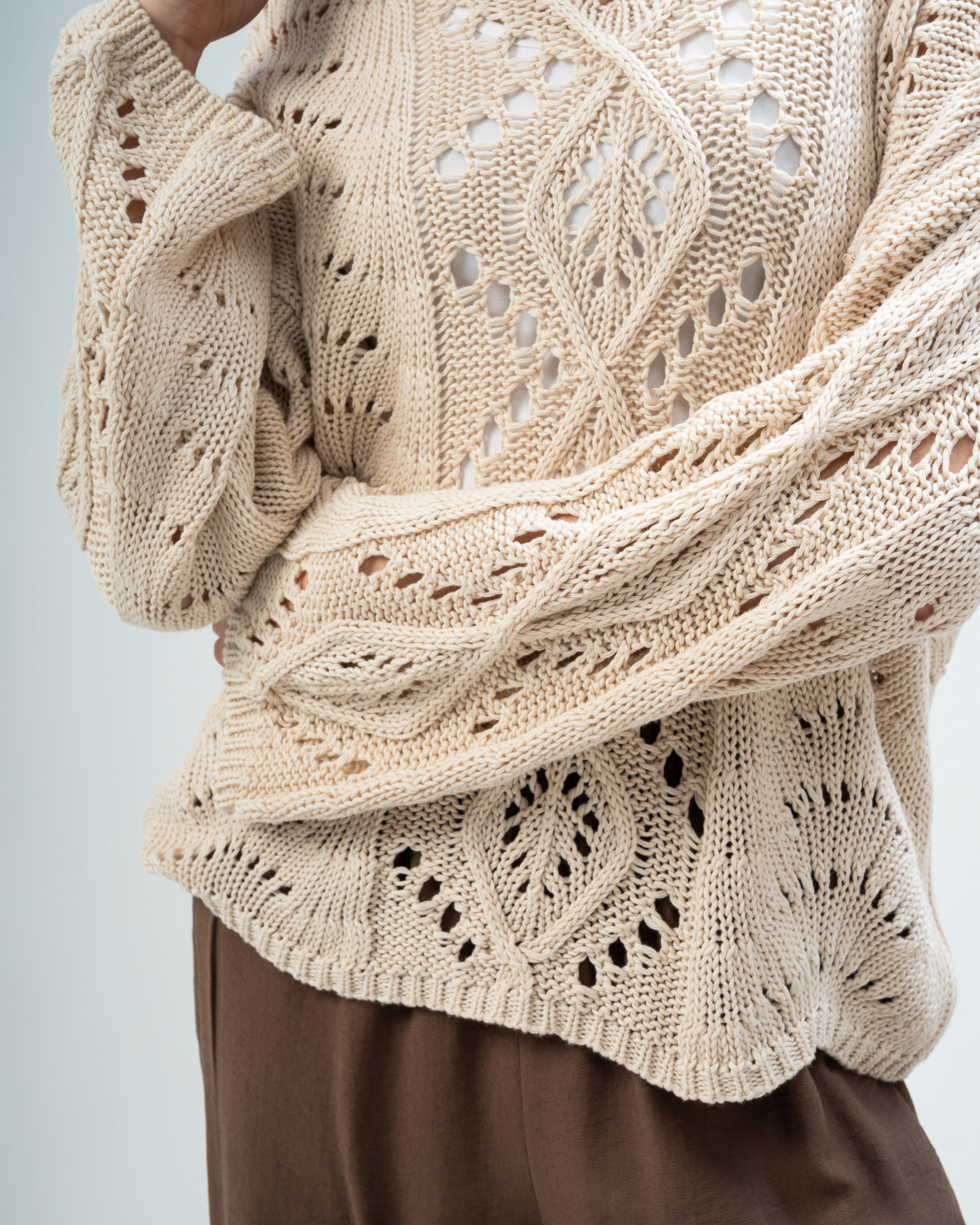 Knitwear with sleeves