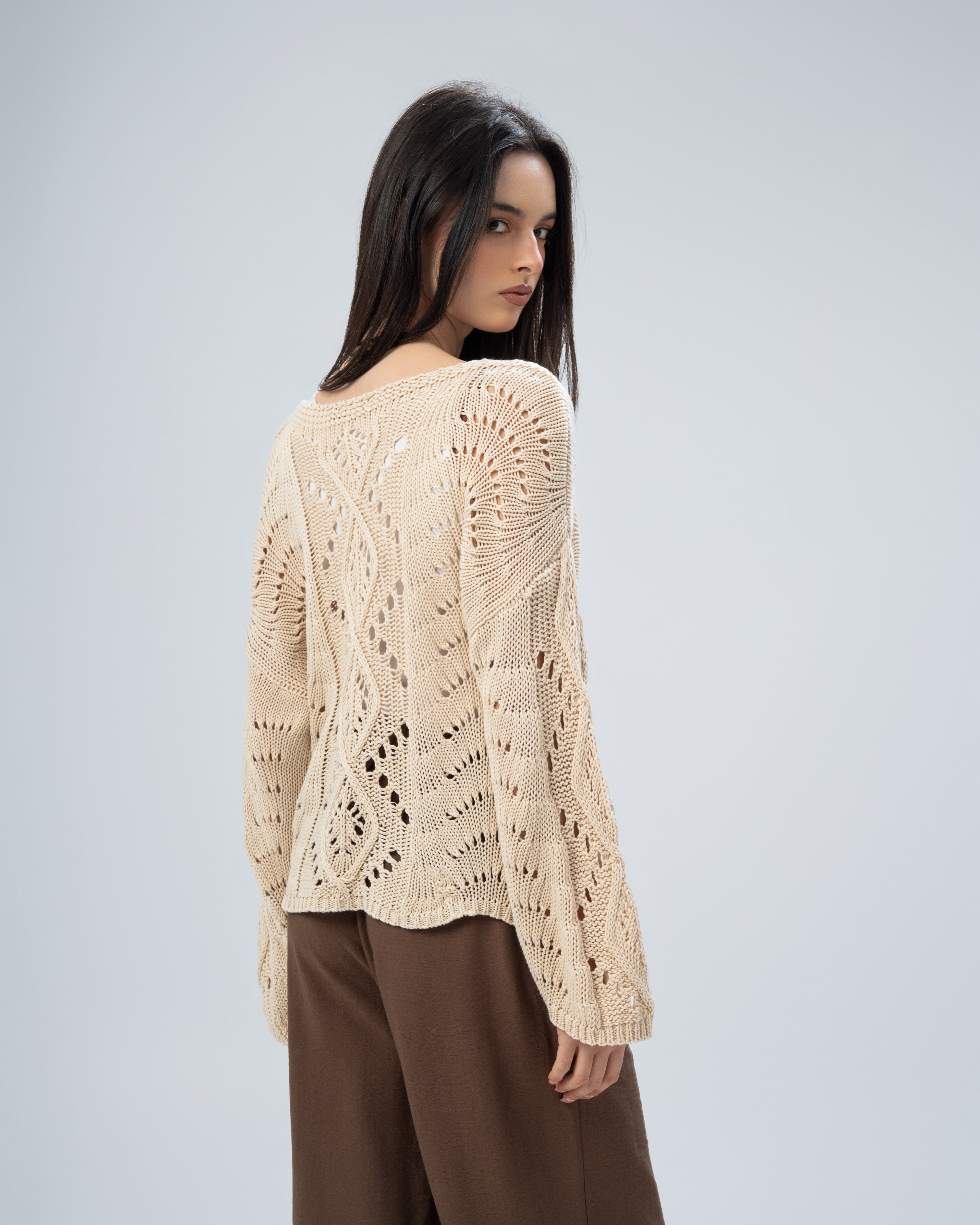 Knitwear with sleeves