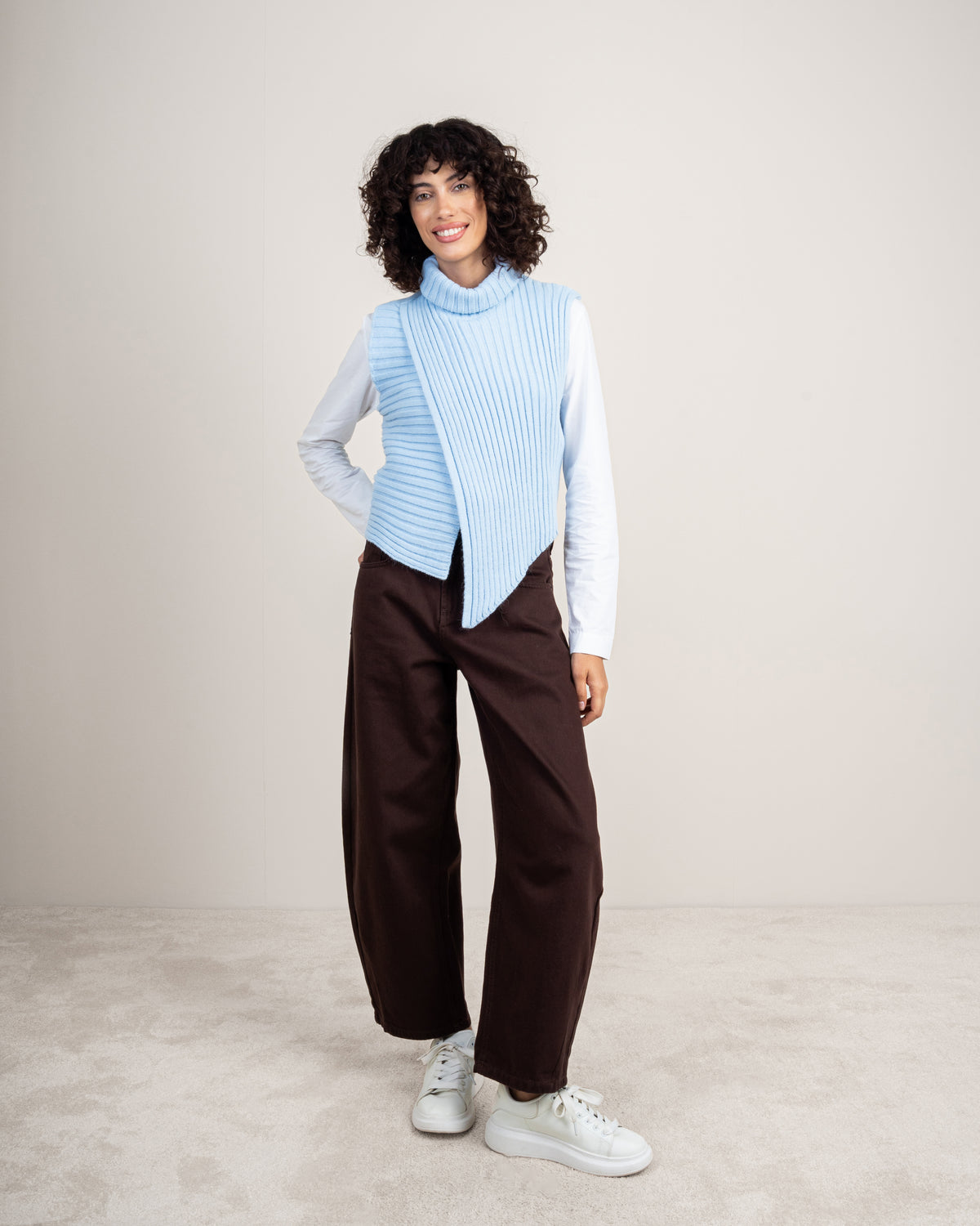 Knitted vest with a neckline