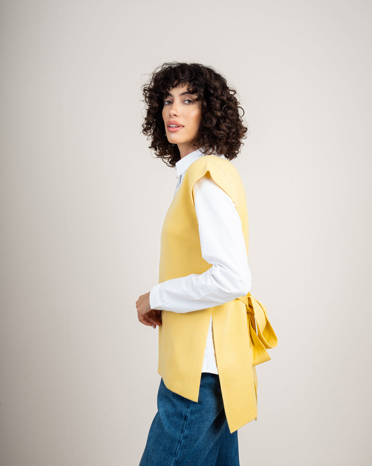 Knit vest with a tie-back detail