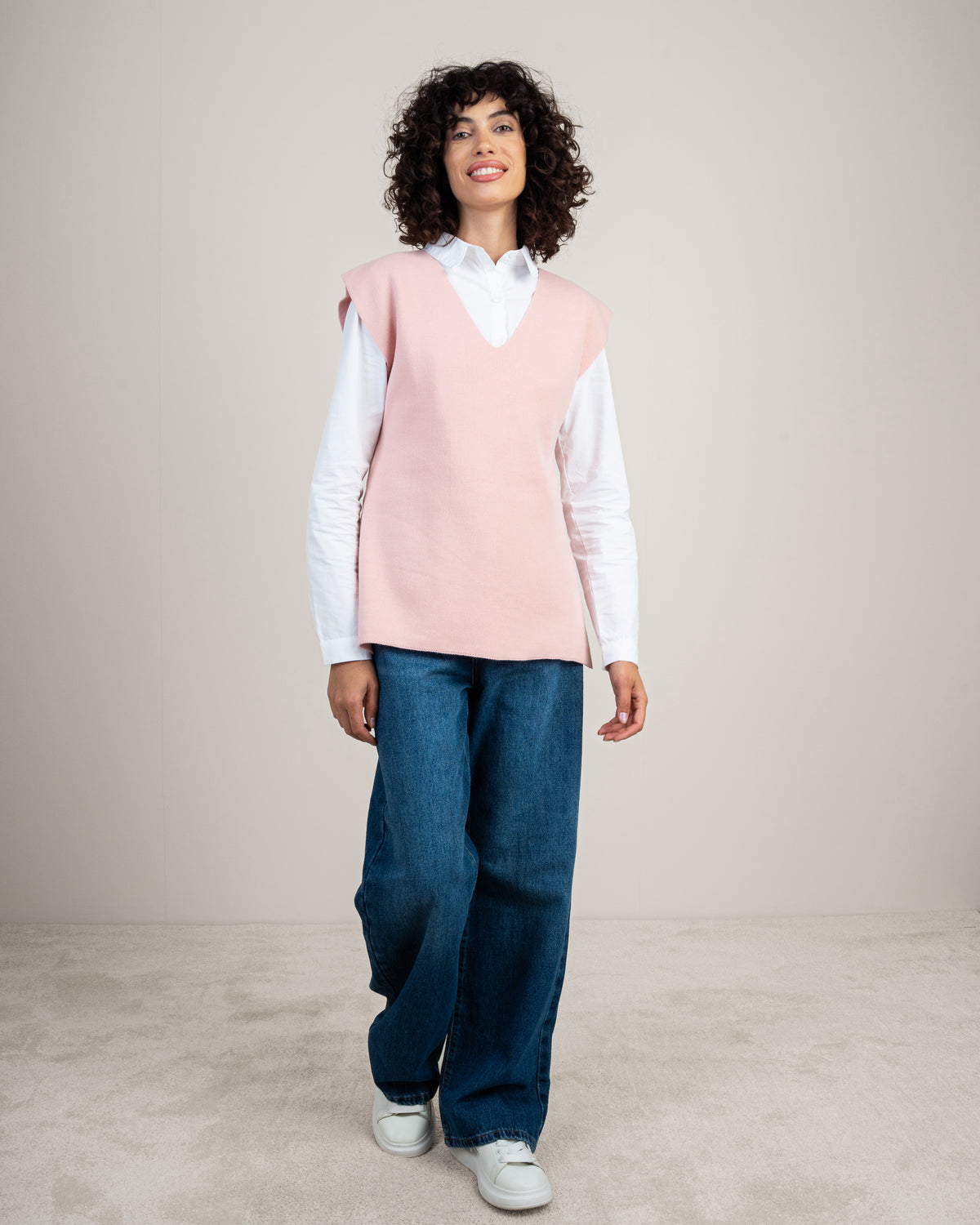 Knit vest with a tie-back detail