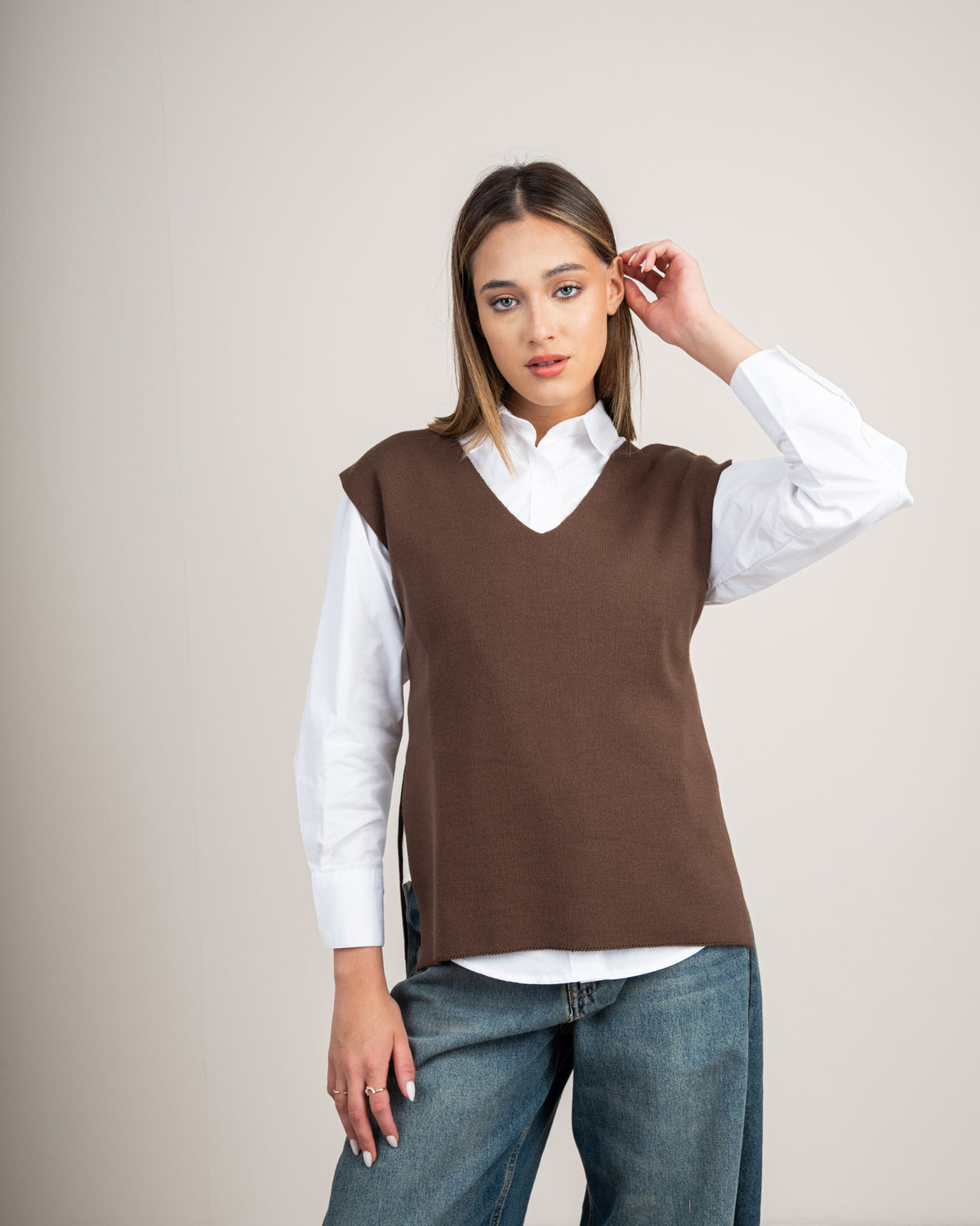 Knit vest with a tie-back detail