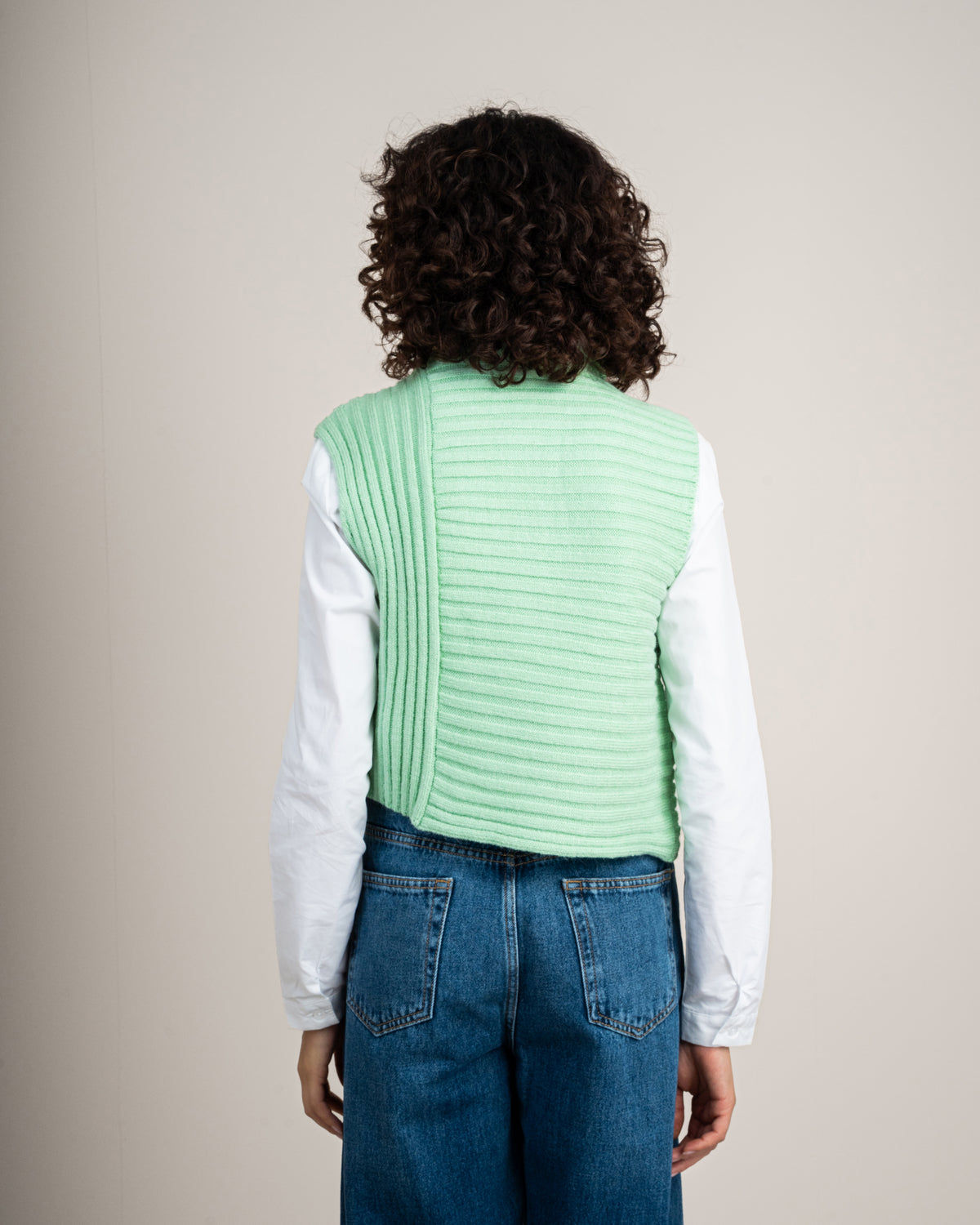 Knitted vest with a neckline