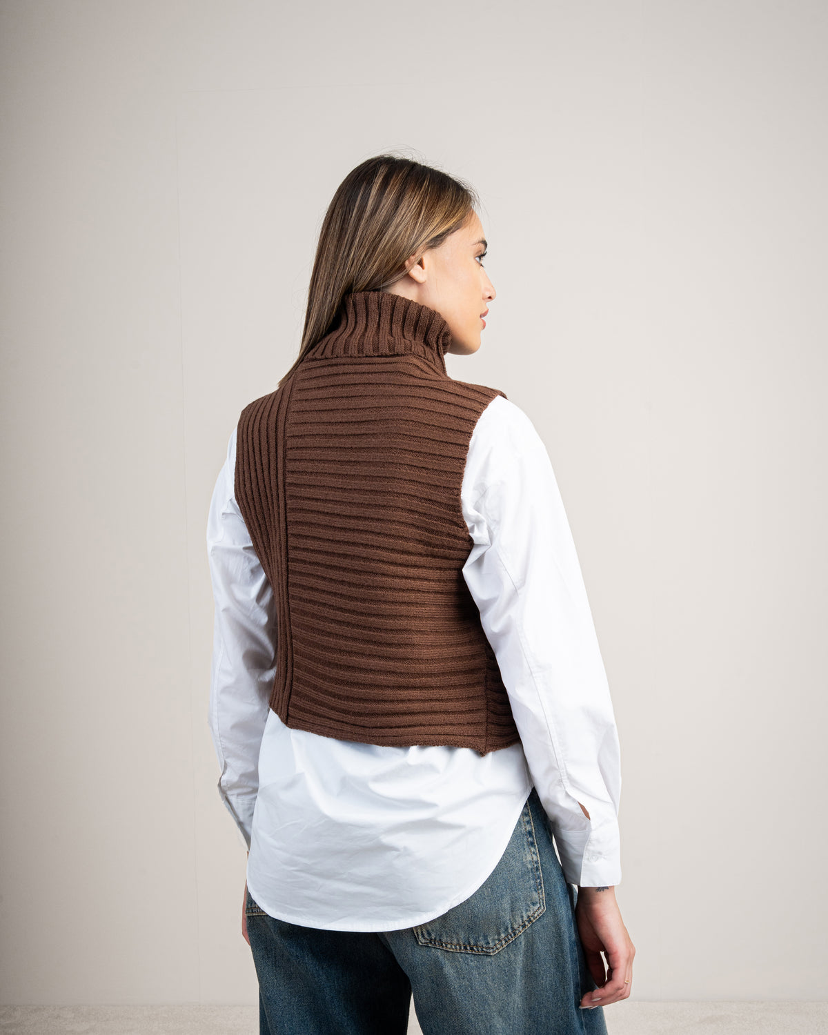 Knitted vest with a neckline