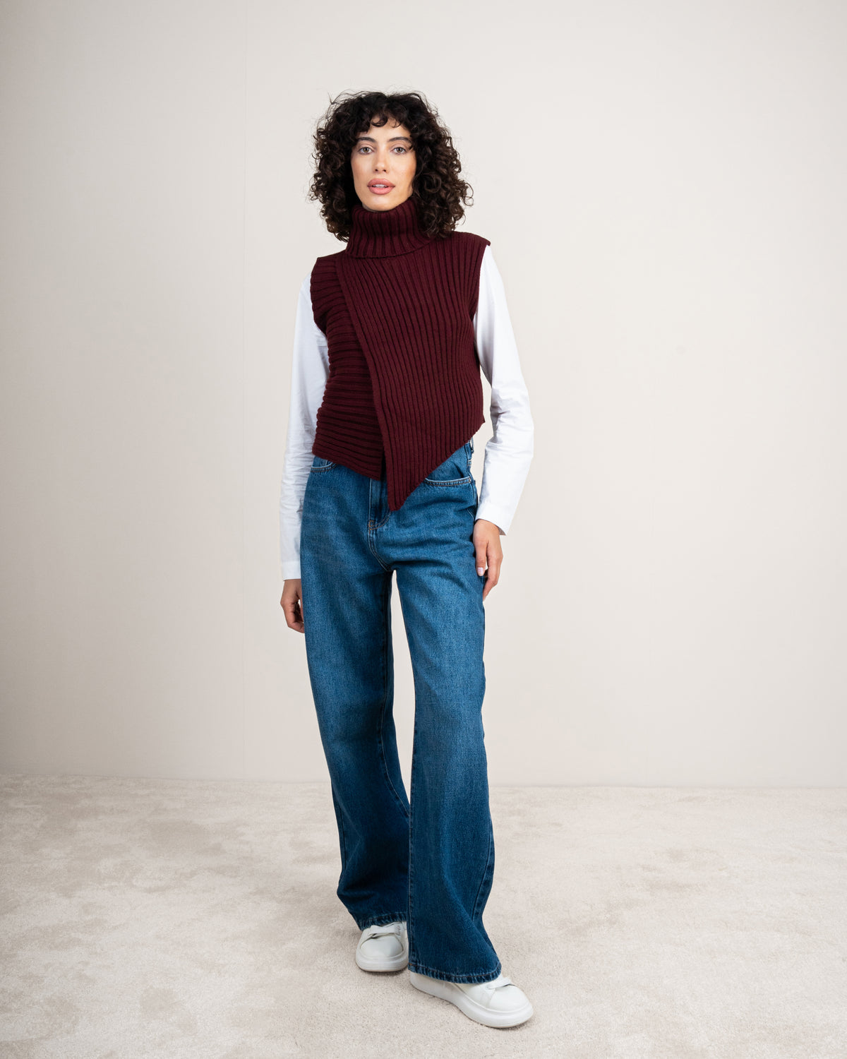 Knitted vest with a neckline