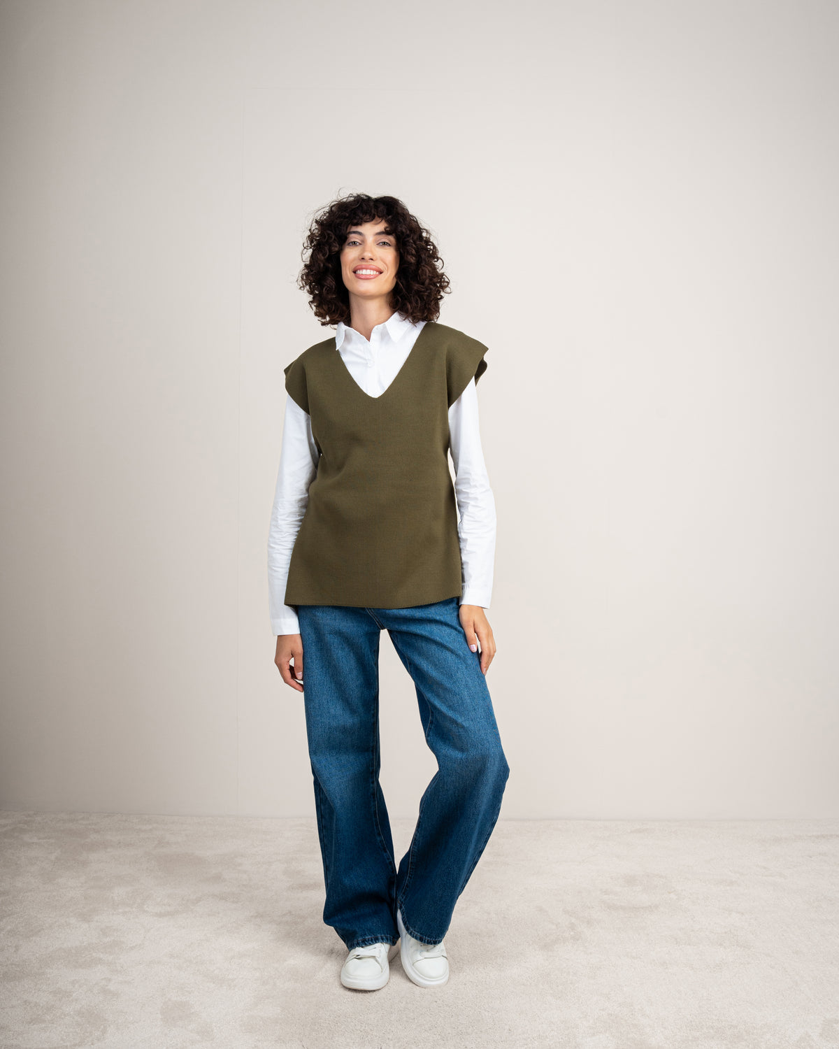 Knit vest with a tie-back detail