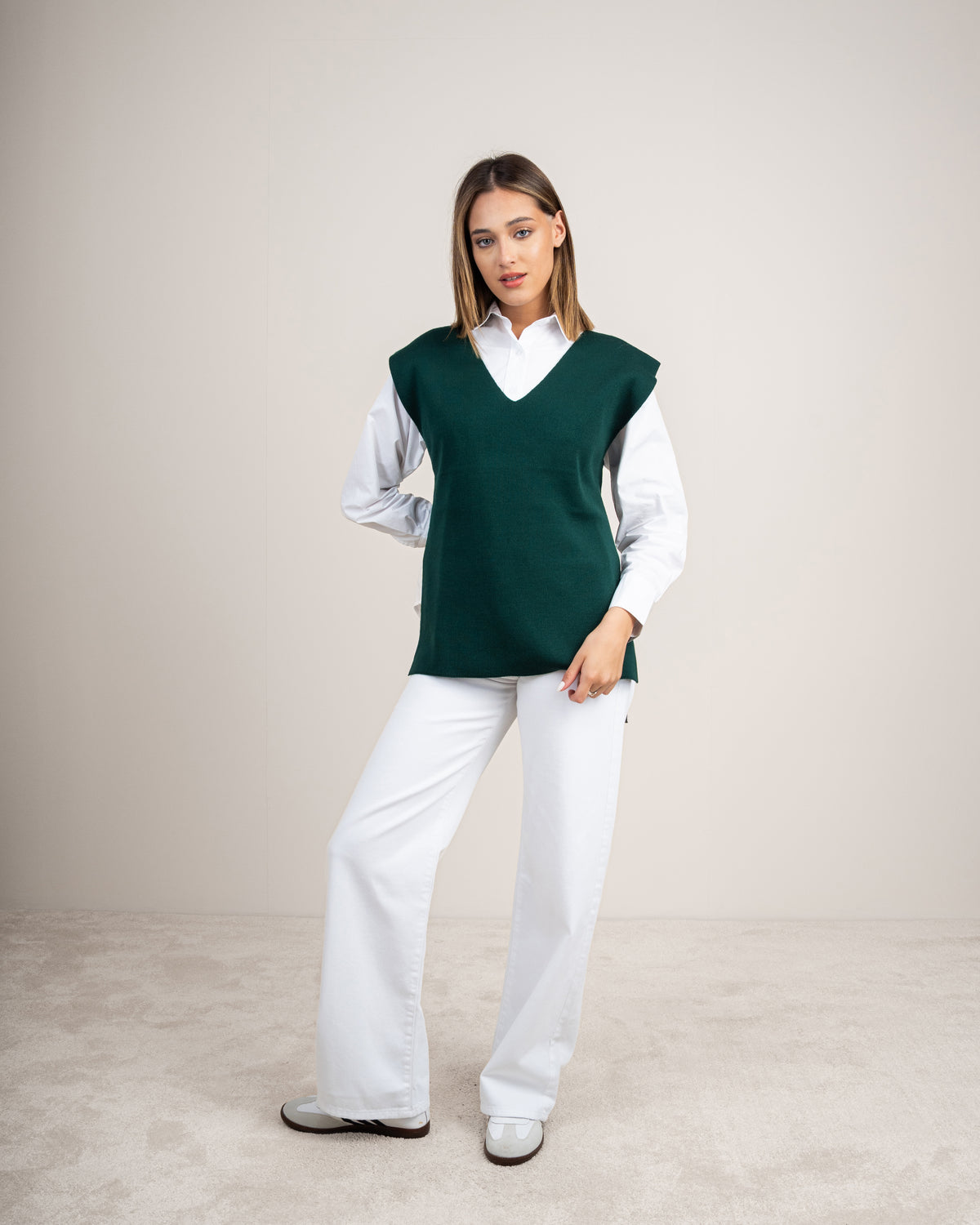 Knit vest with a tie-back detail
