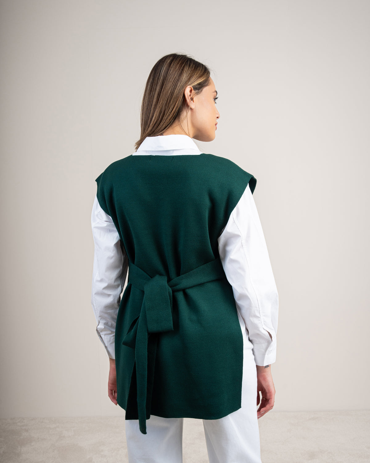 Knit vest with a tie-back detail