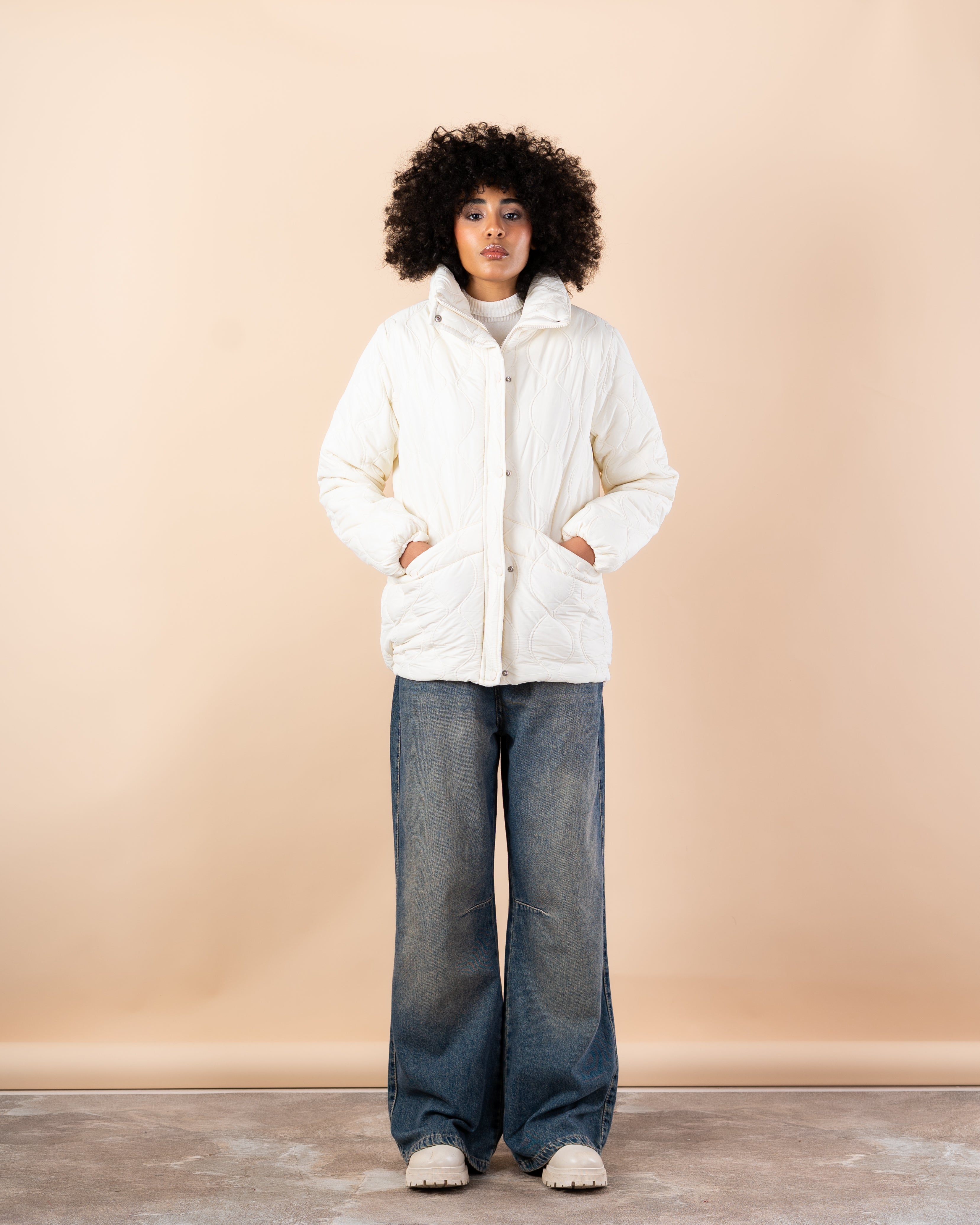 Waterproof jacket with caps