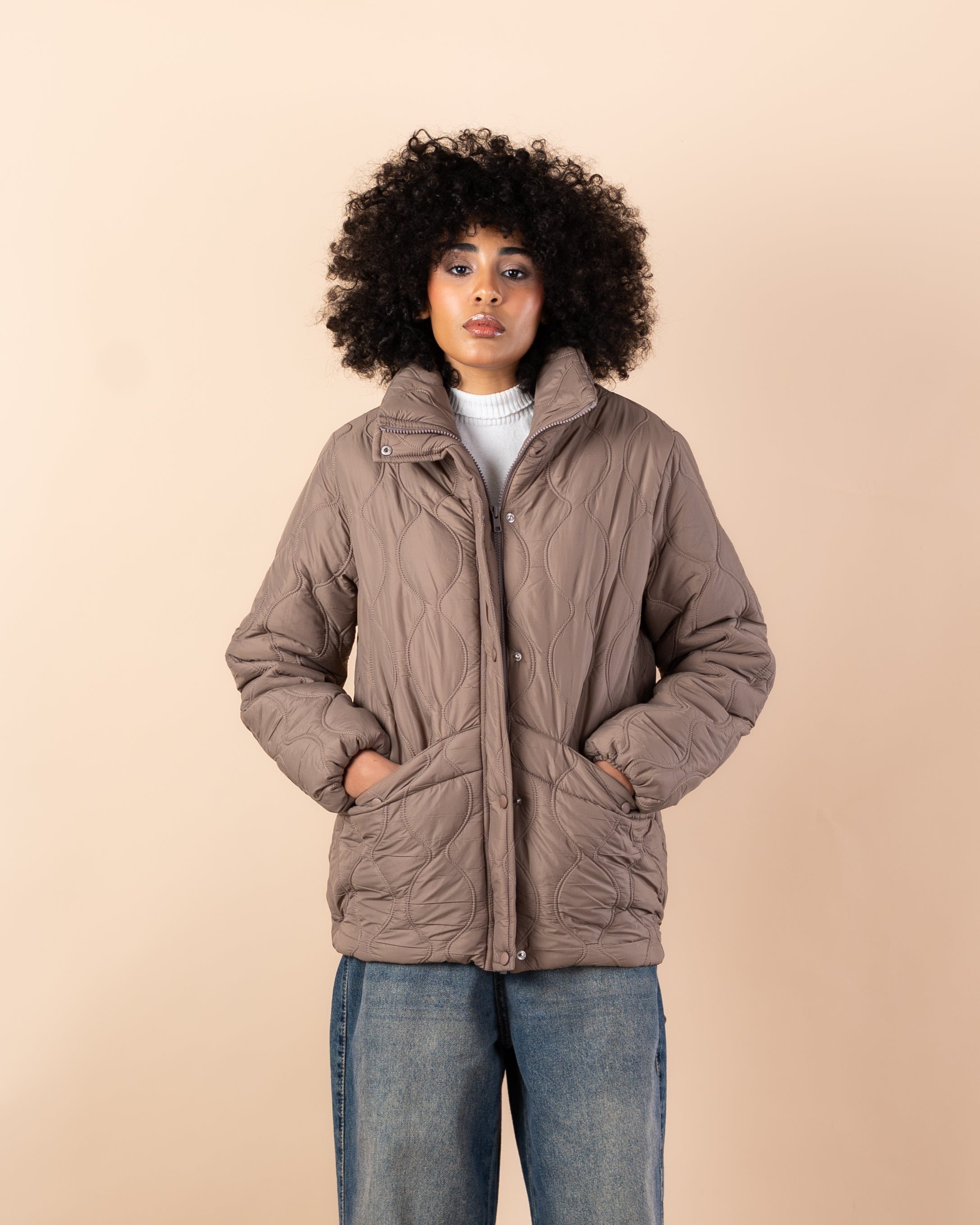 Waterproof jacket with caps