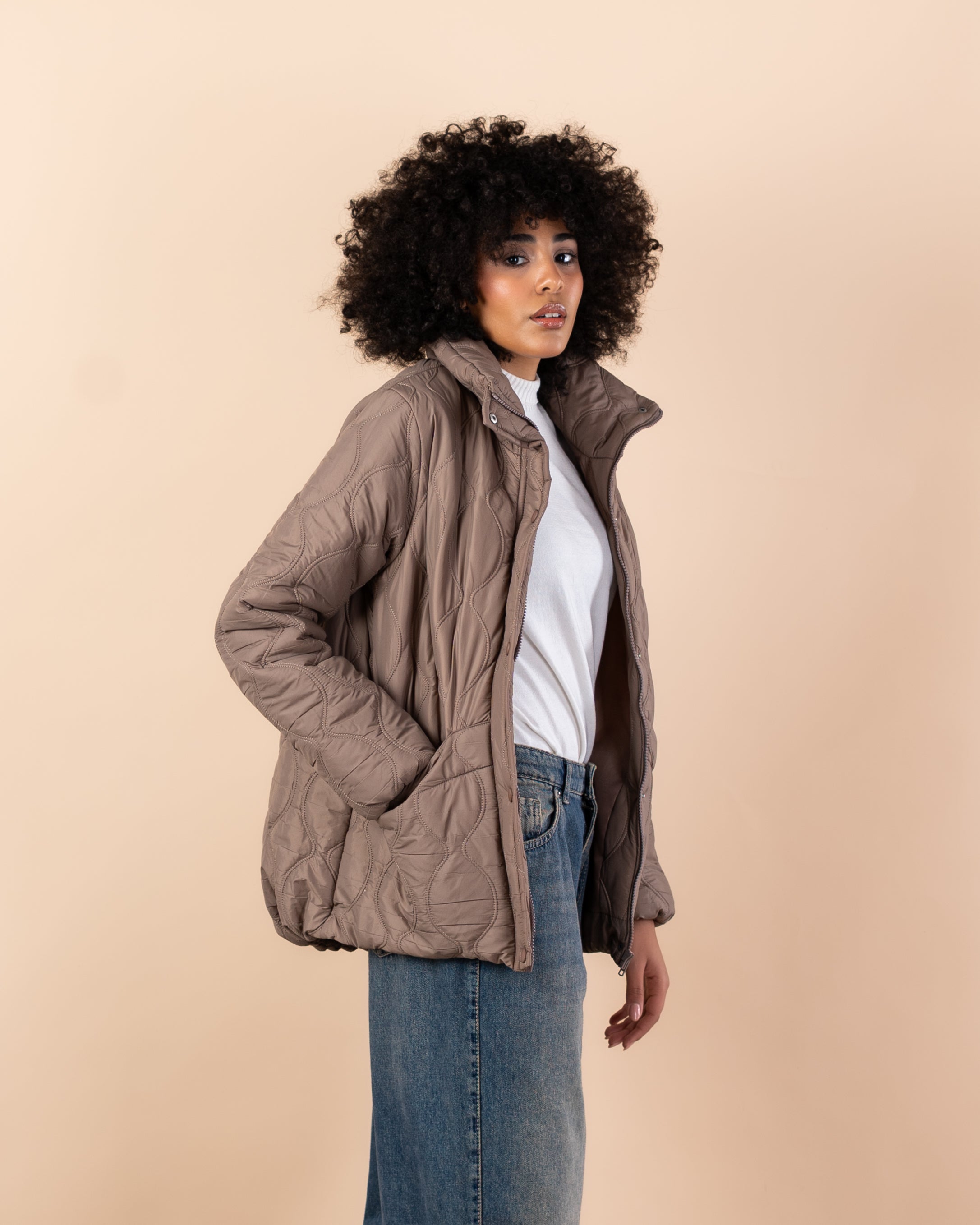 Waterproof jacket with caps