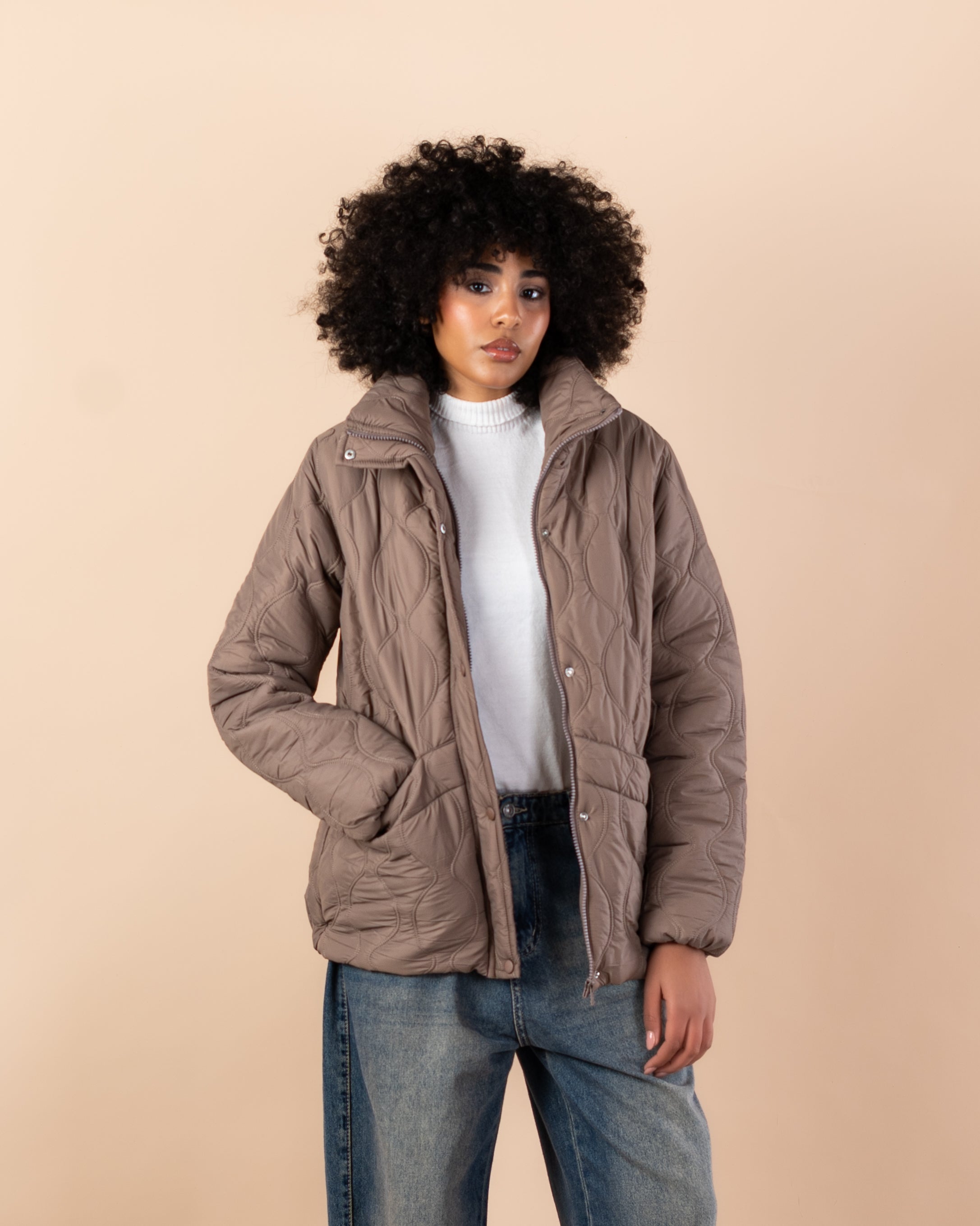 Waterproof jacket with caps