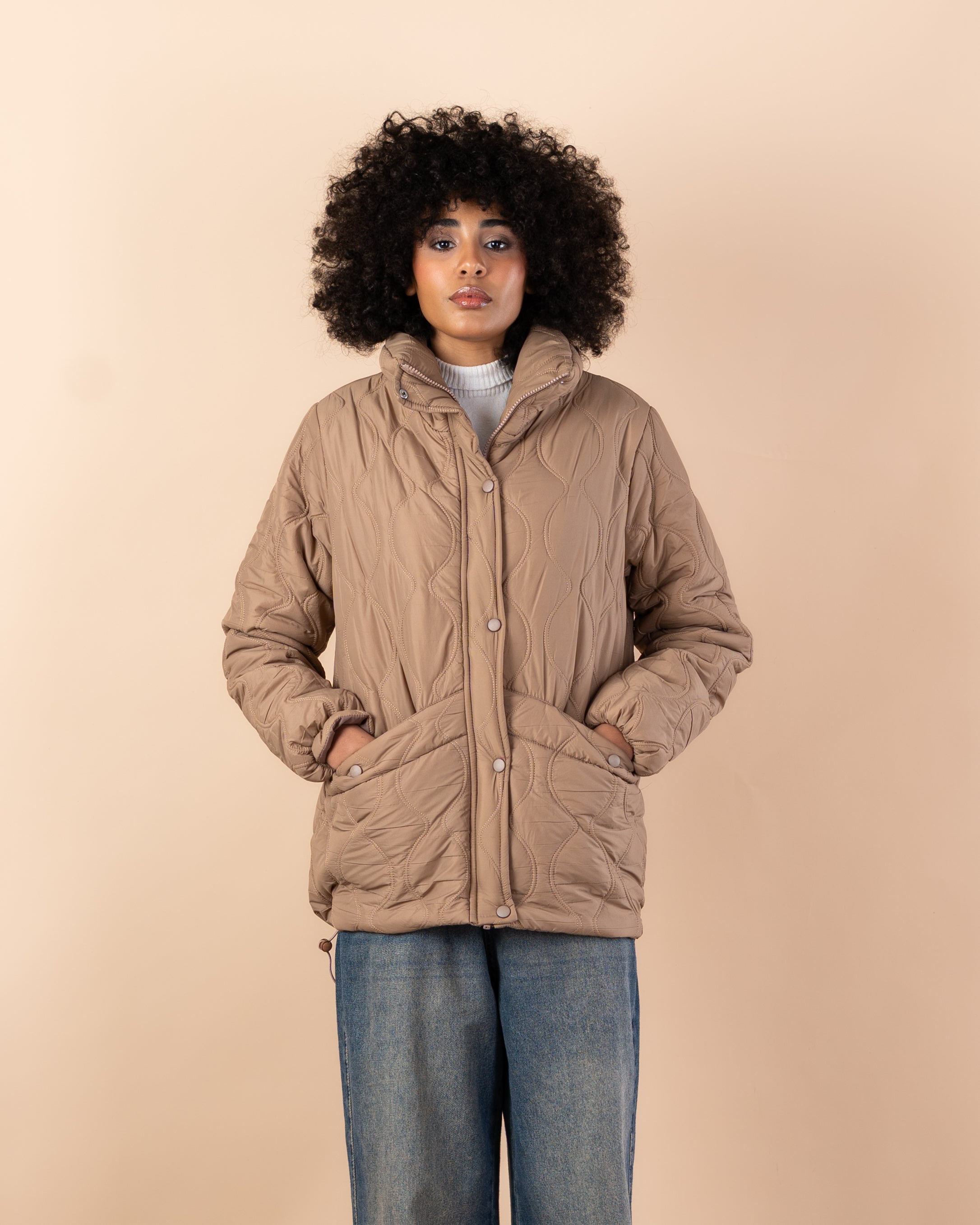 Waterproof jacket with caps