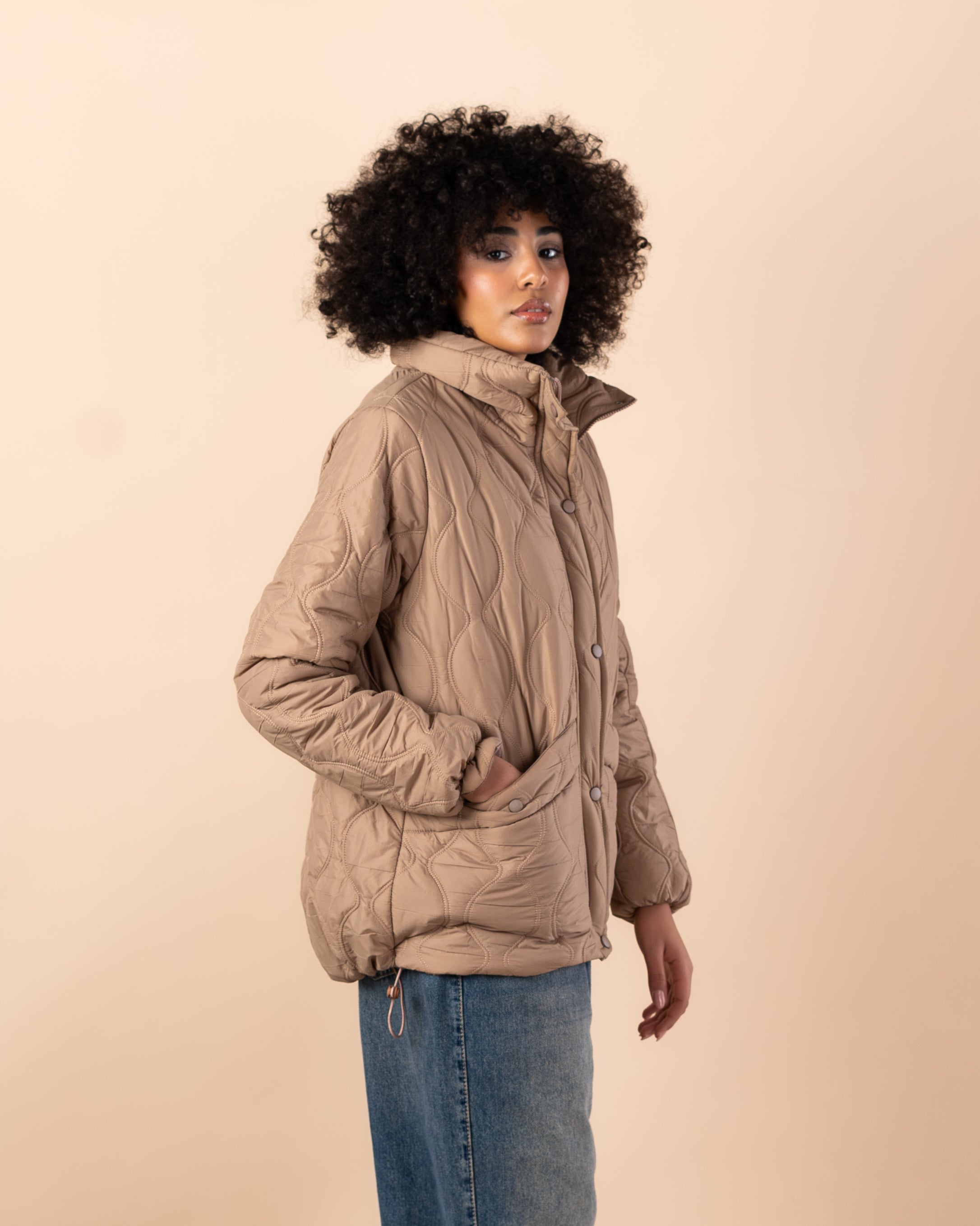 Waterproof jacket with caps