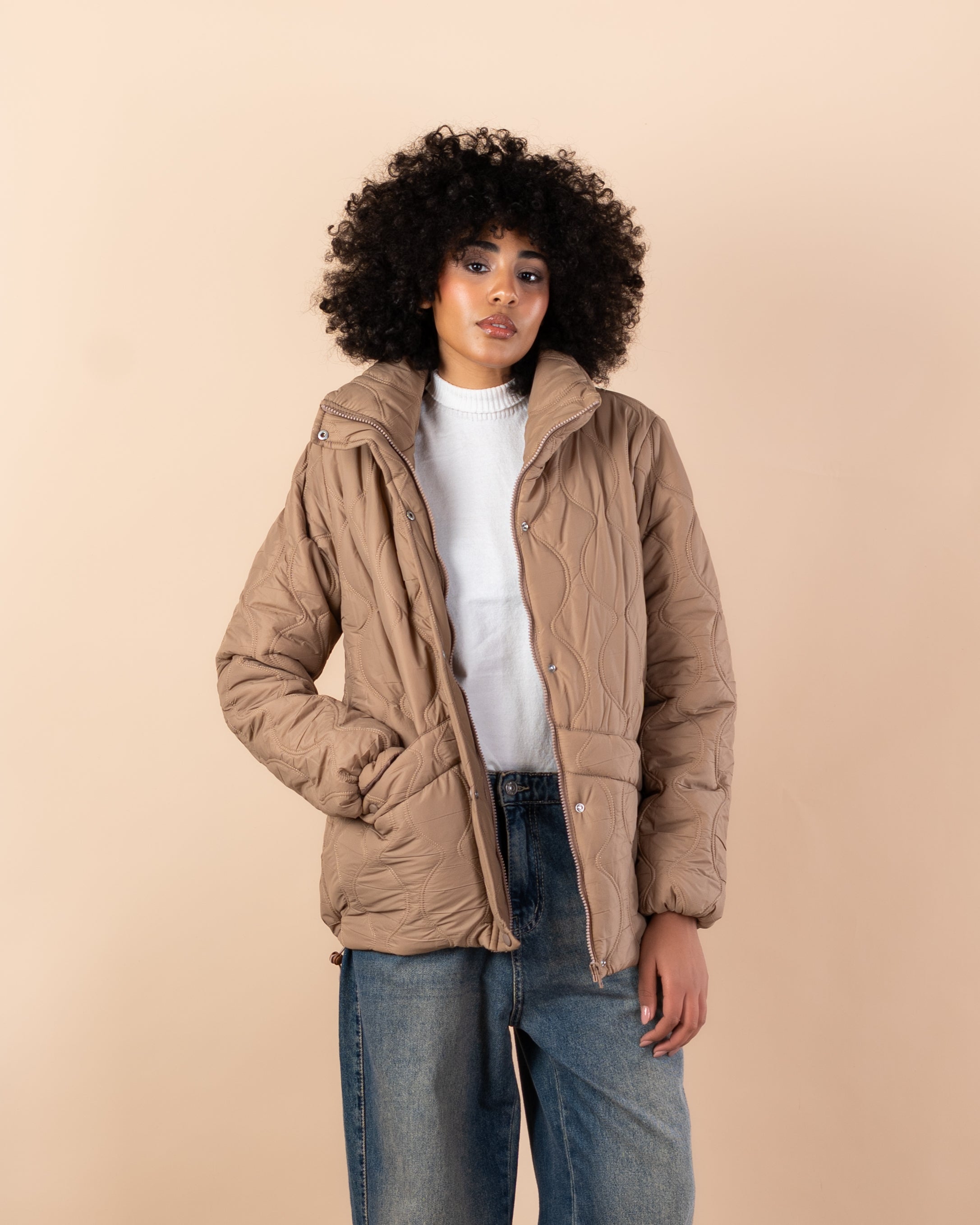 Waterproof jacket with caps