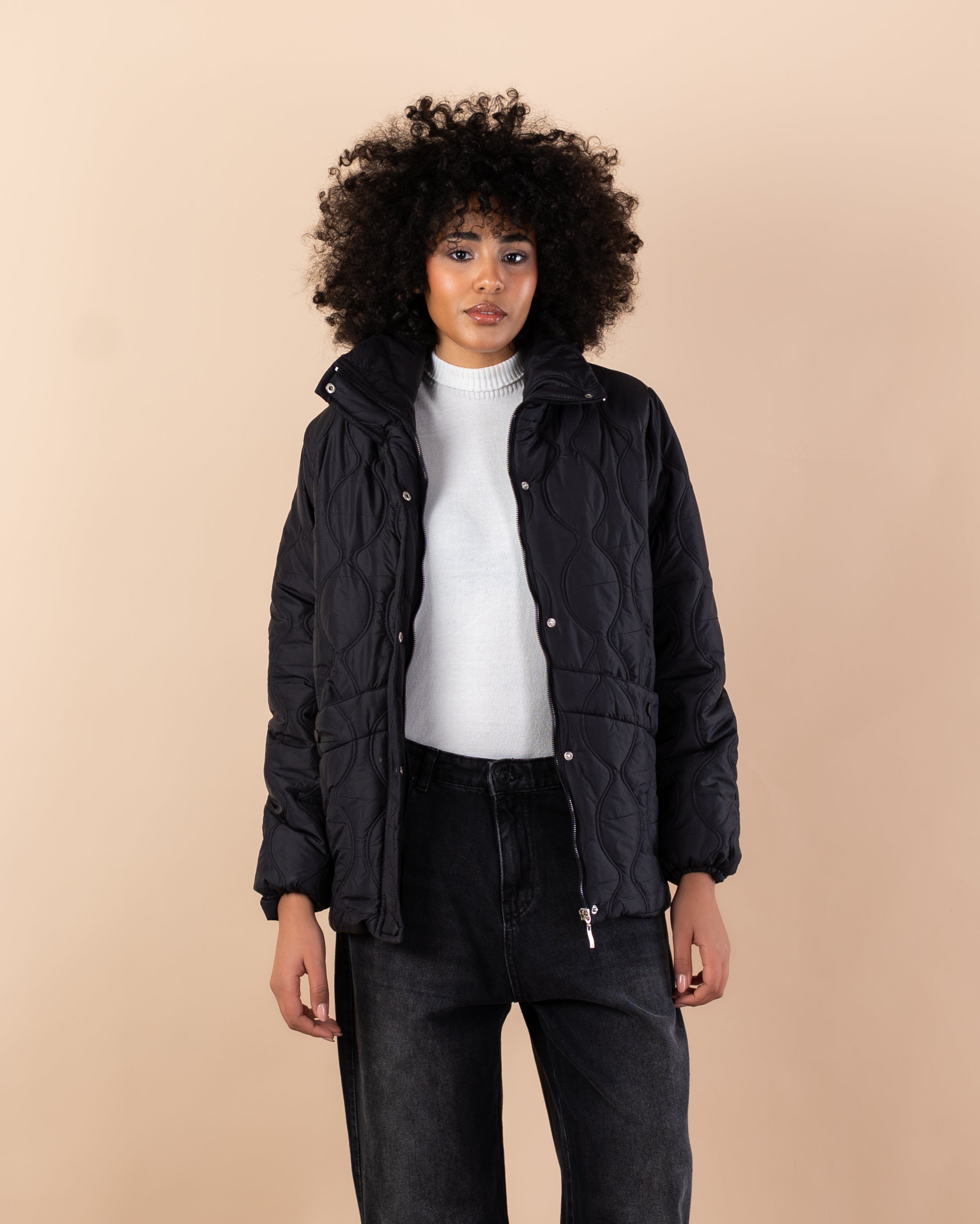 Waterproof jacket with caps