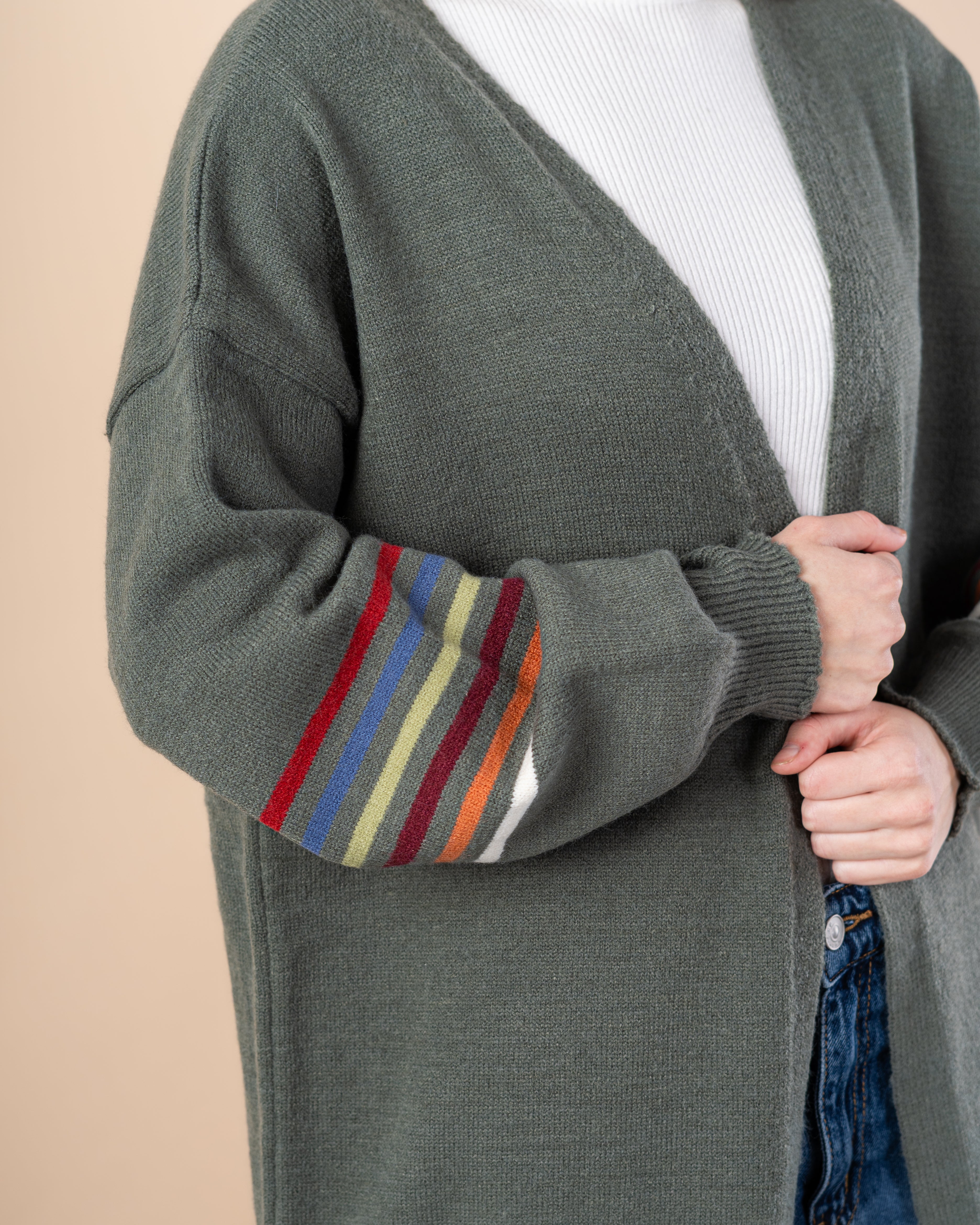 Knitted cardigan in - colors on the sleeves