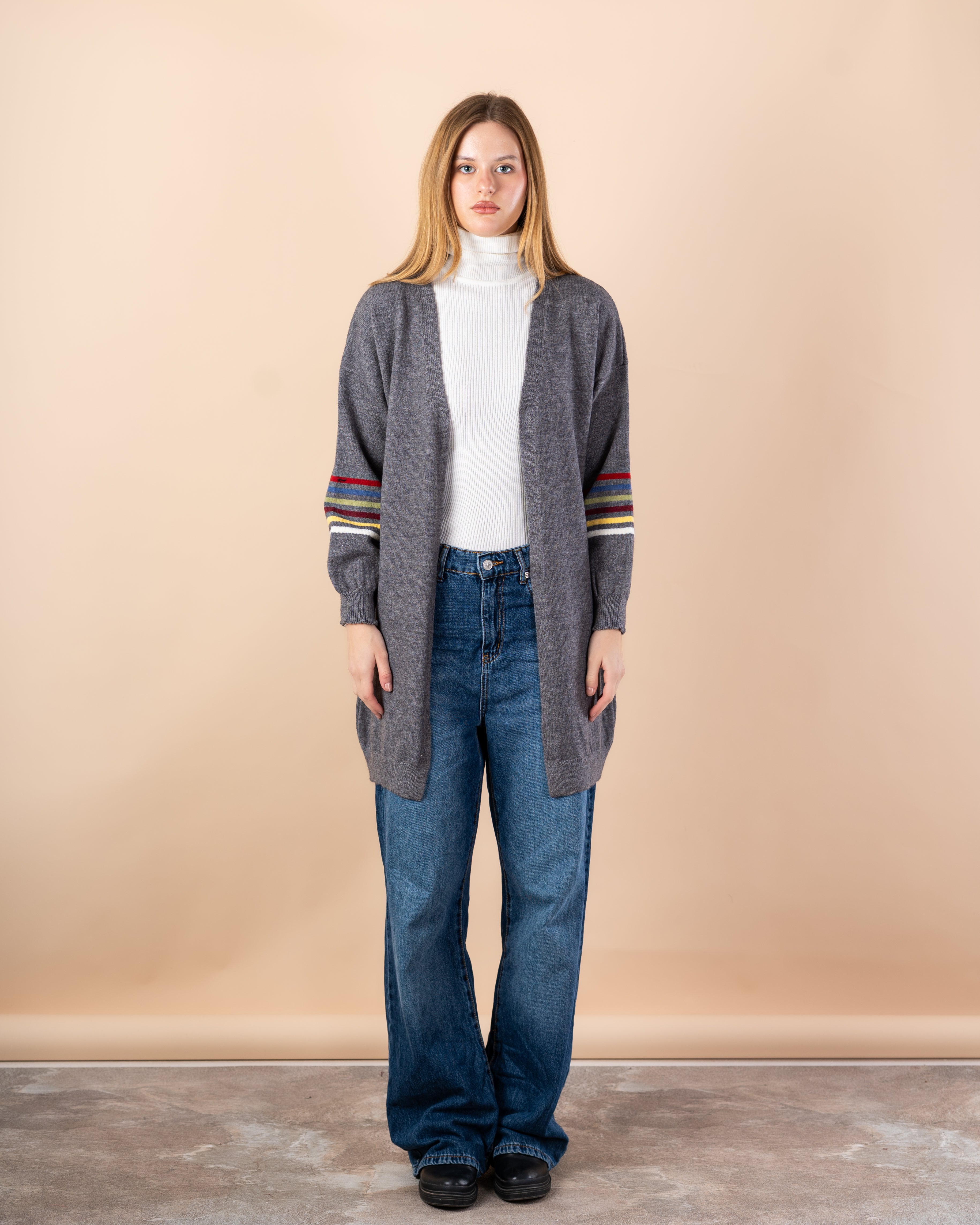 Knitted cardigan in - colors on the sleeves