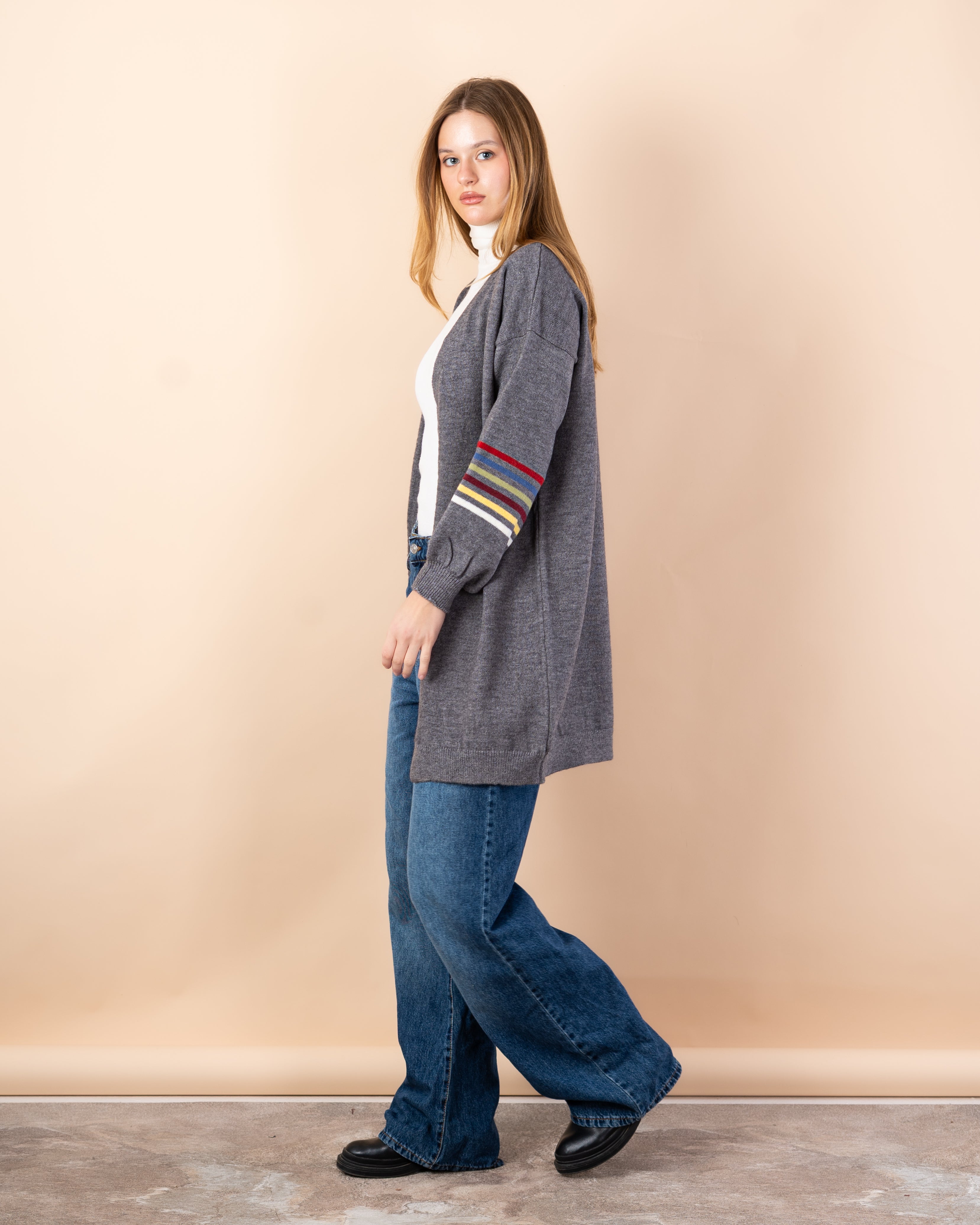 Knitted cardigan in - colors on the sleeves