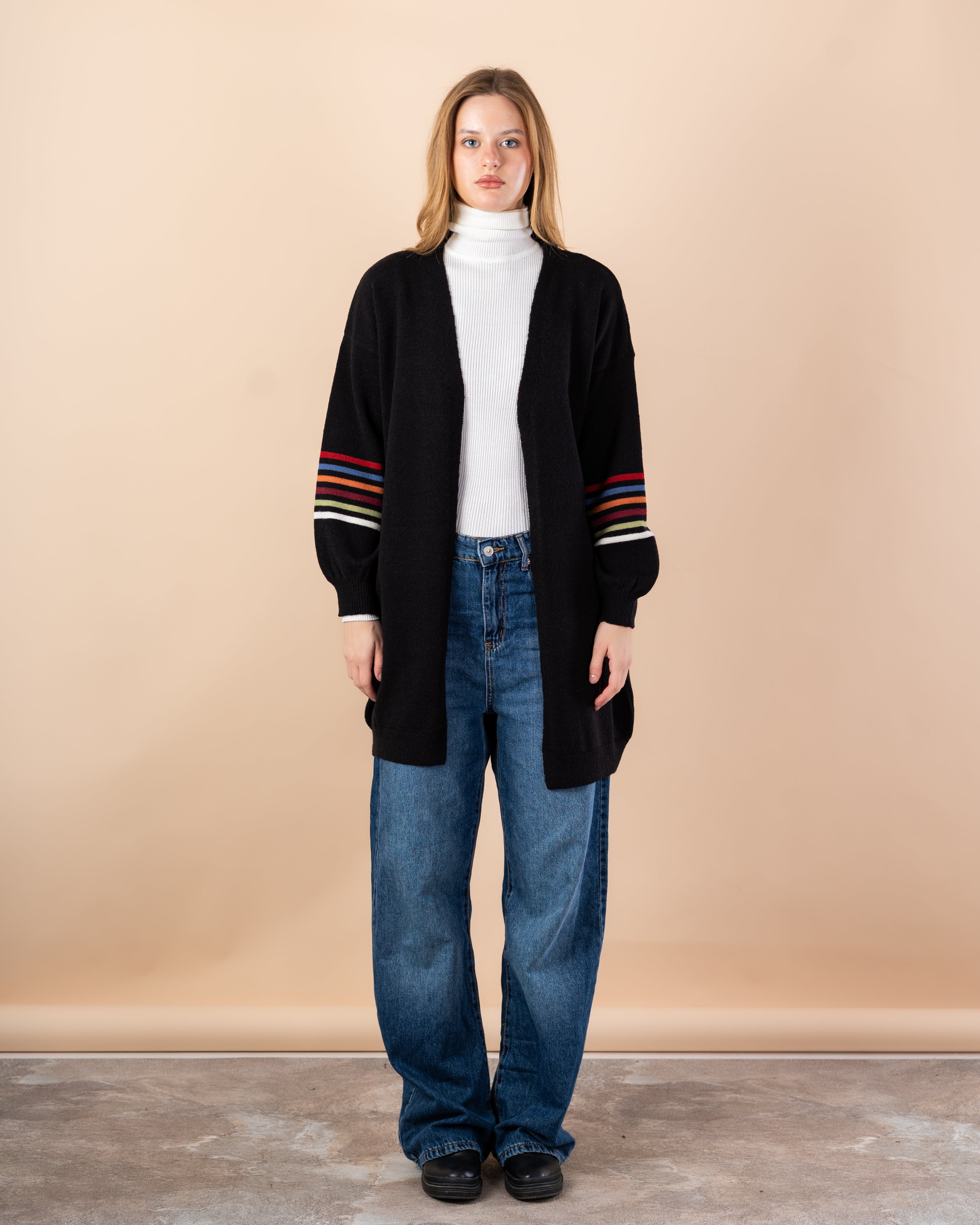 Knitted cardigan in - colors on the sleeves