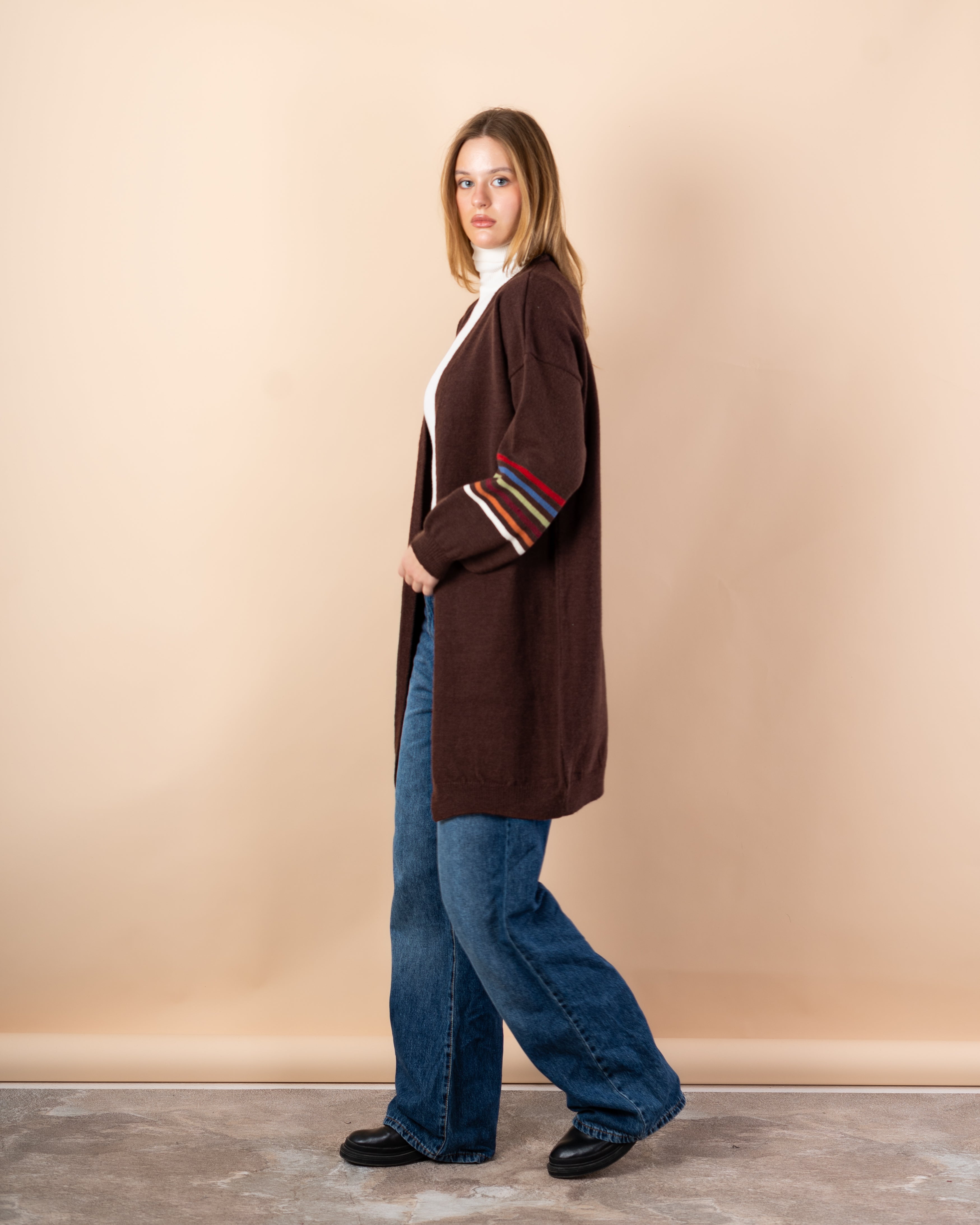 Knitted cardigan in - colors on the sleeves