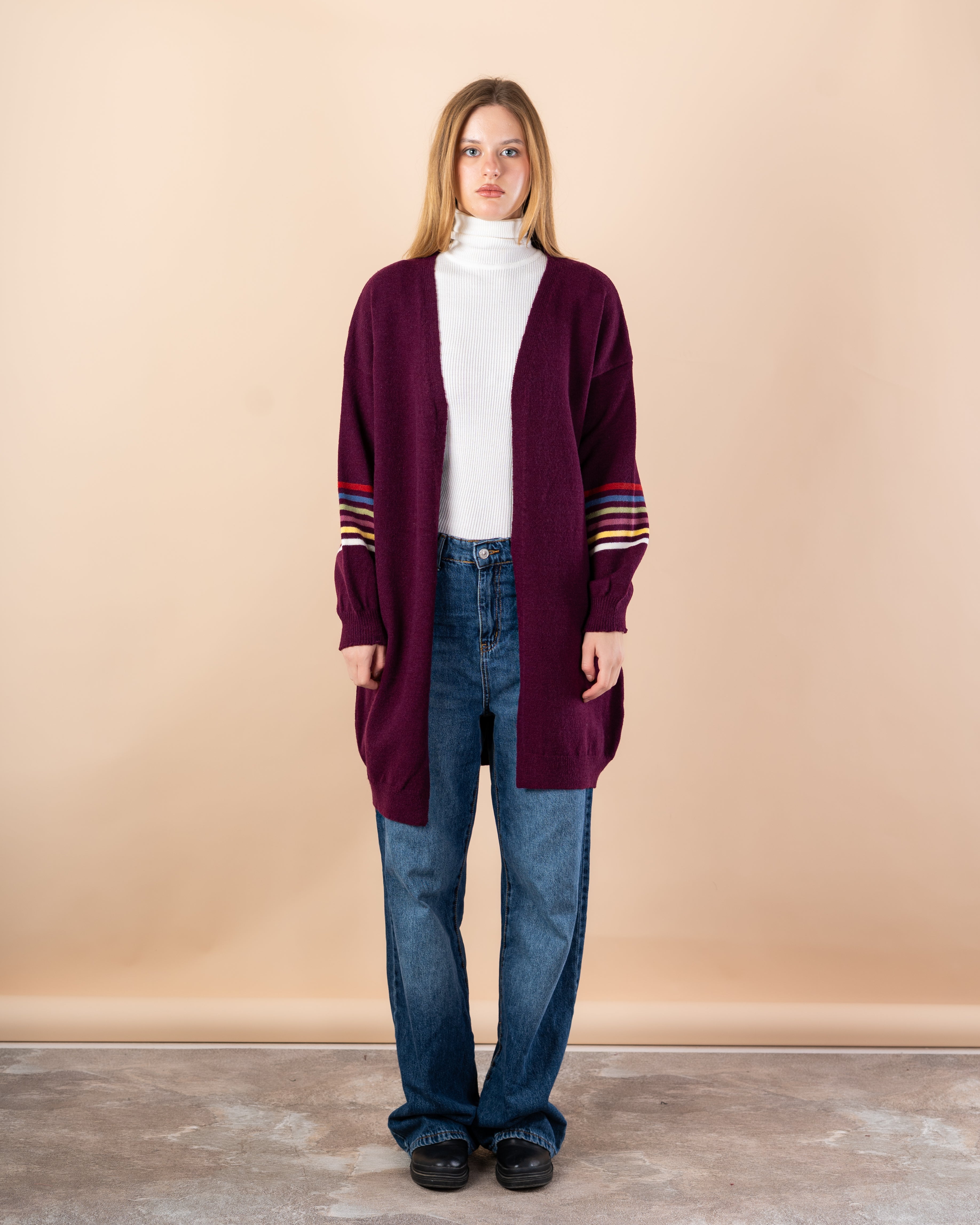 Knitted cardigan in - colors on the sleeves