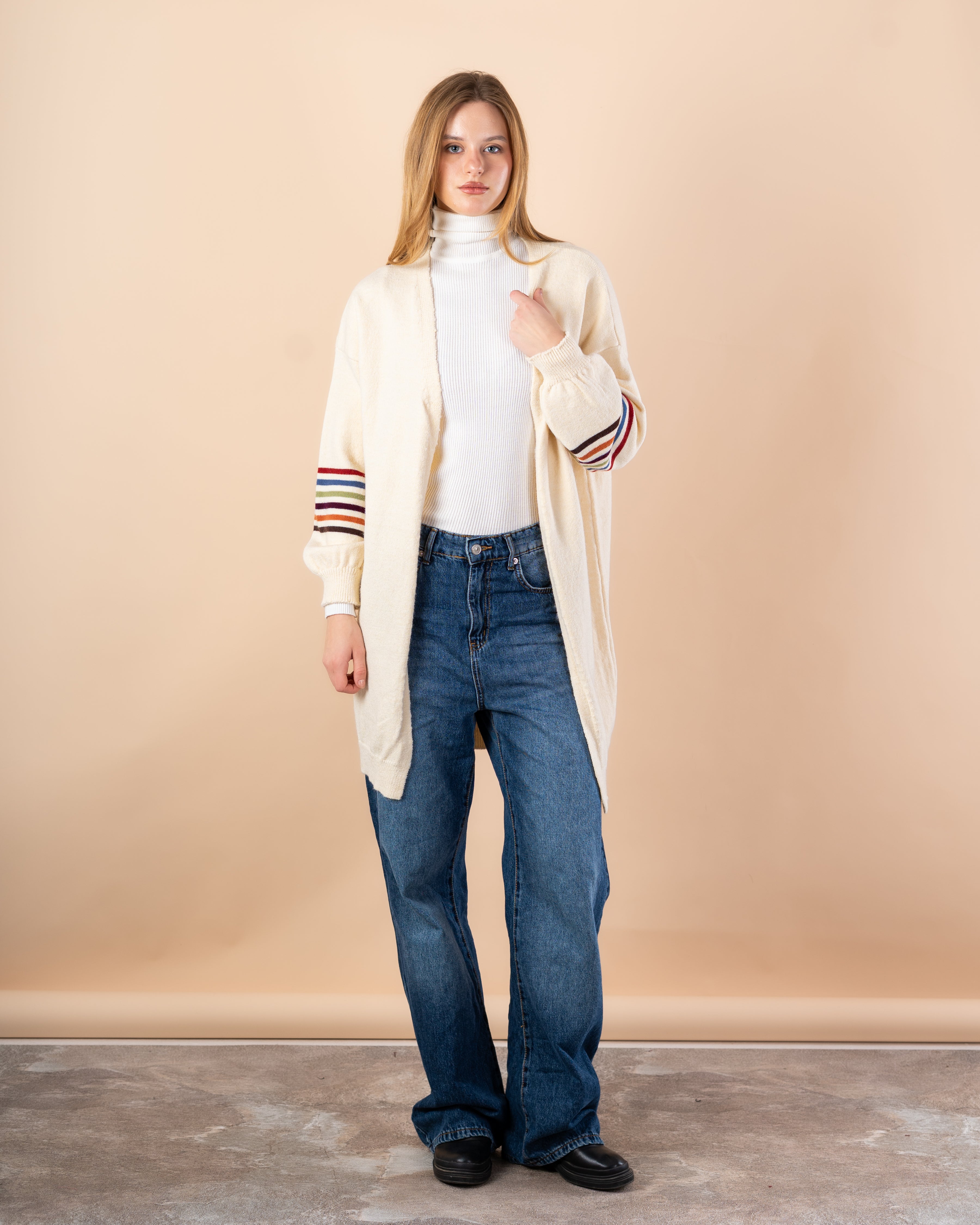 Knitted cardigan in - colors on the sleeves