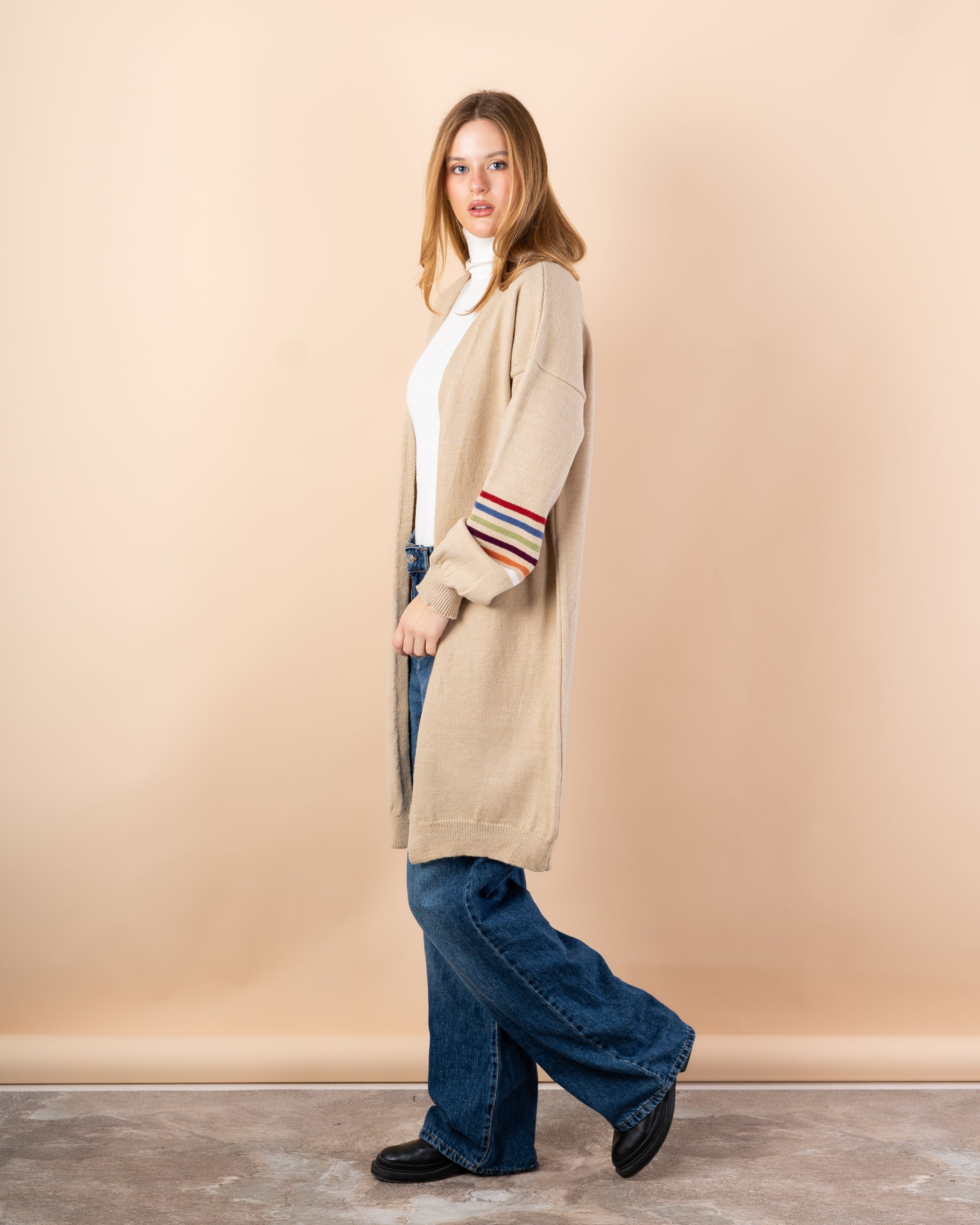 Knitted cardigan in - colors on the sleeves