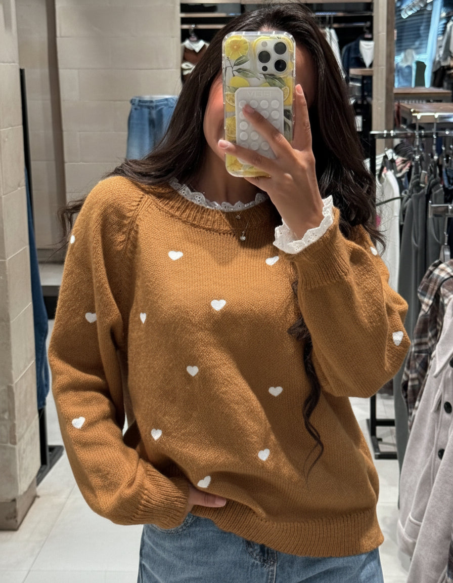 Pullover with hearts and a lace on the neck and sleeves