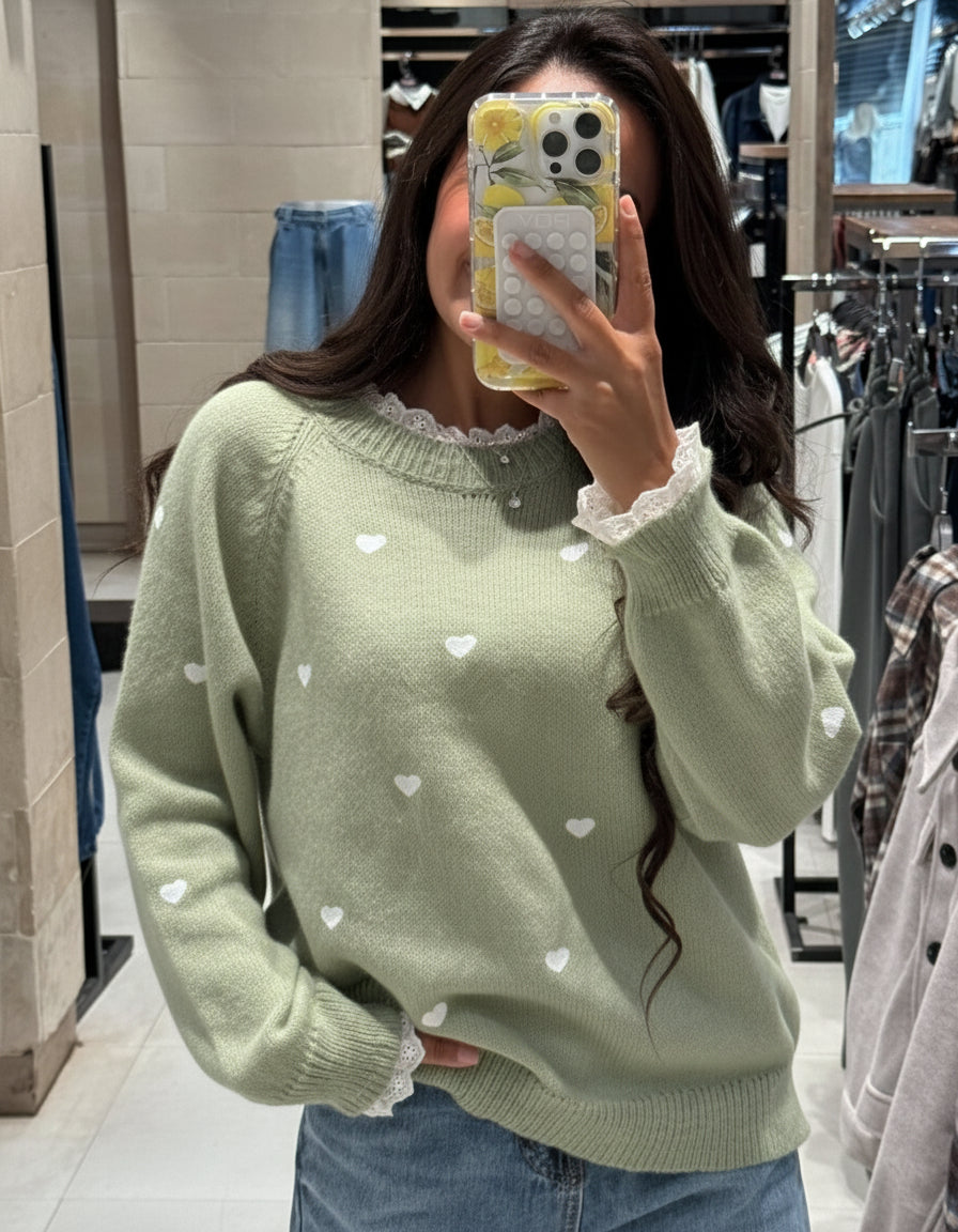 Pullover with hearts and a lace on the neck and sleeves
