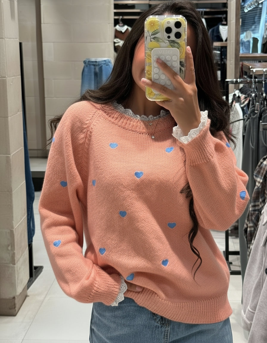 Pullover with hearts and a lace on the neck and sleeves