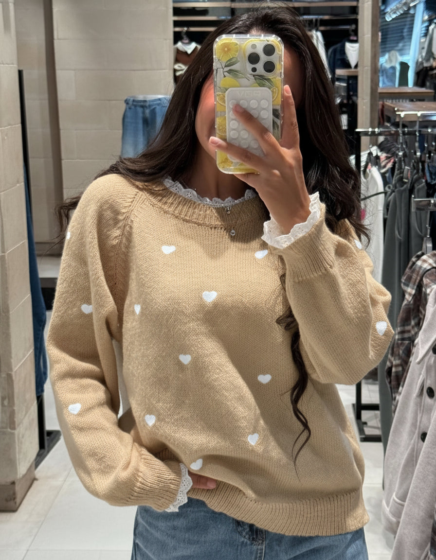 Pullover with hearts and a lace on the neck and sleeves