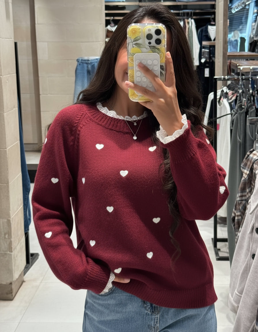 Pullover with hearts and a lace on the neck and sleeves