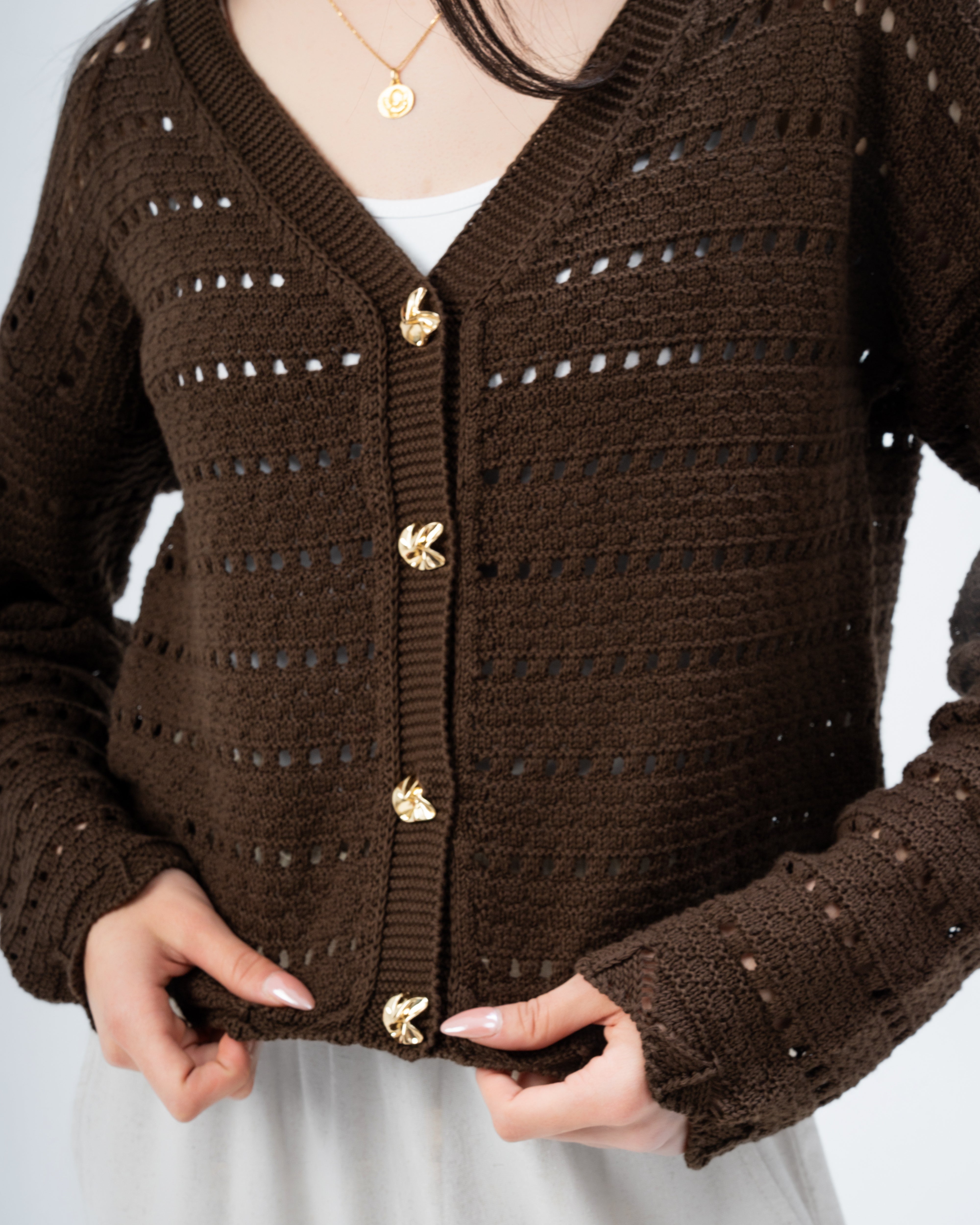knitted Jacket with buttons.