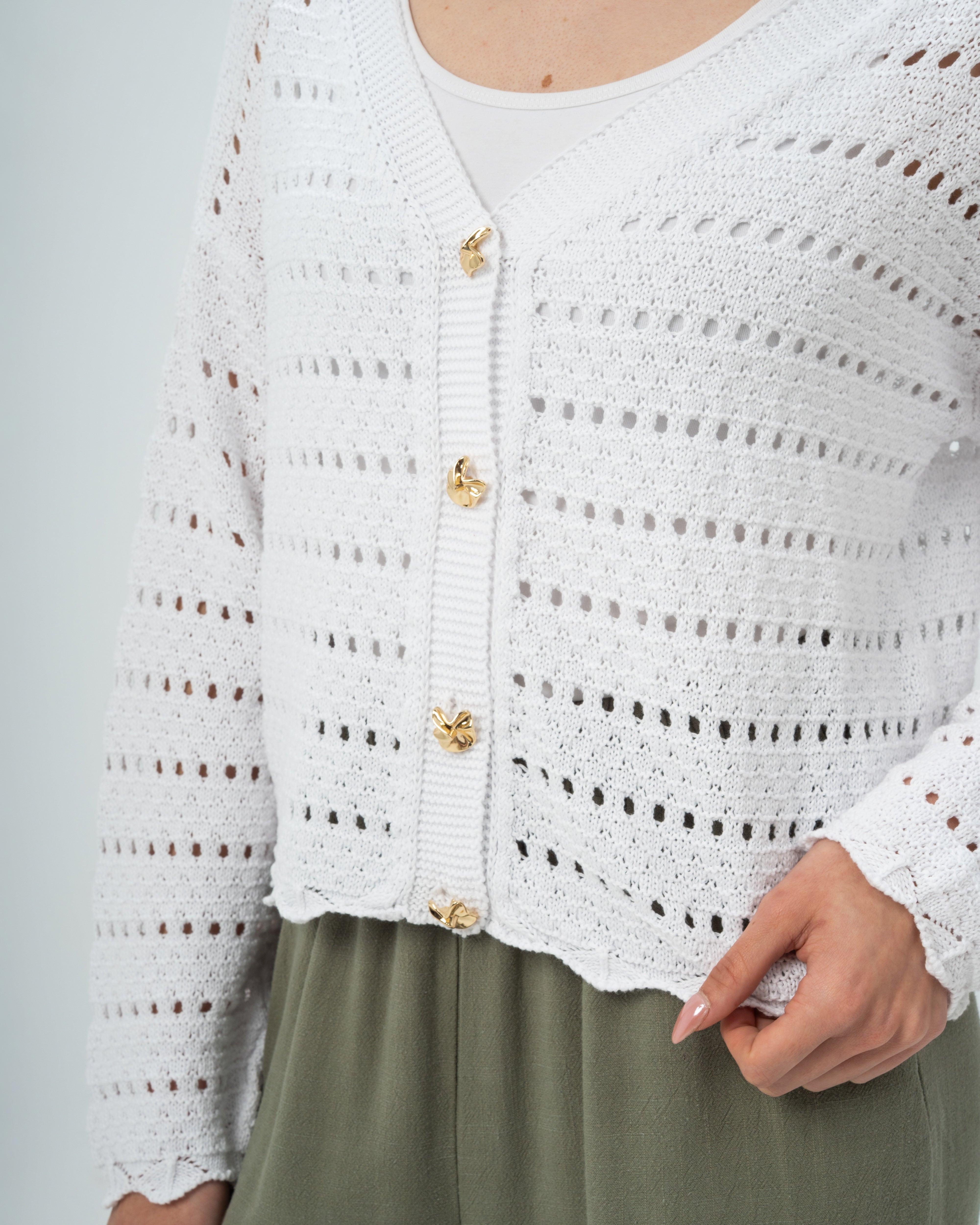 knitted Jacket with buttons.