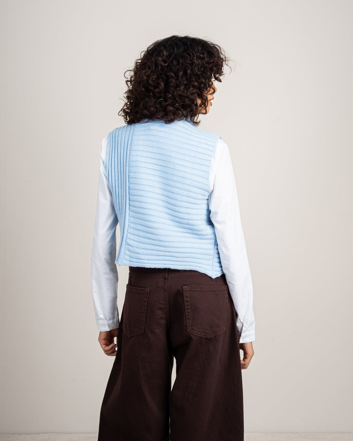 Knitted vest with a neckline