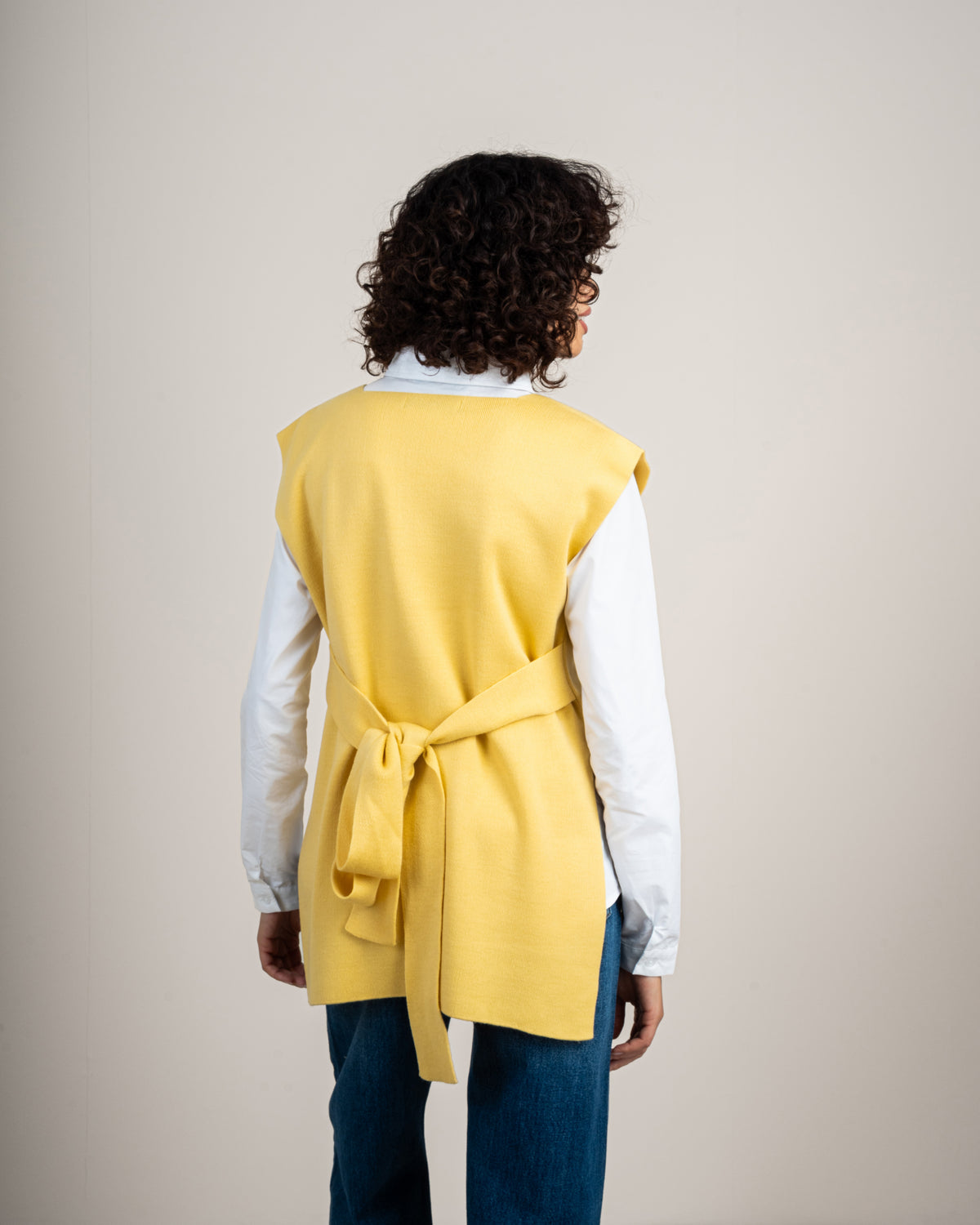 Knit vest with a tie-back detail