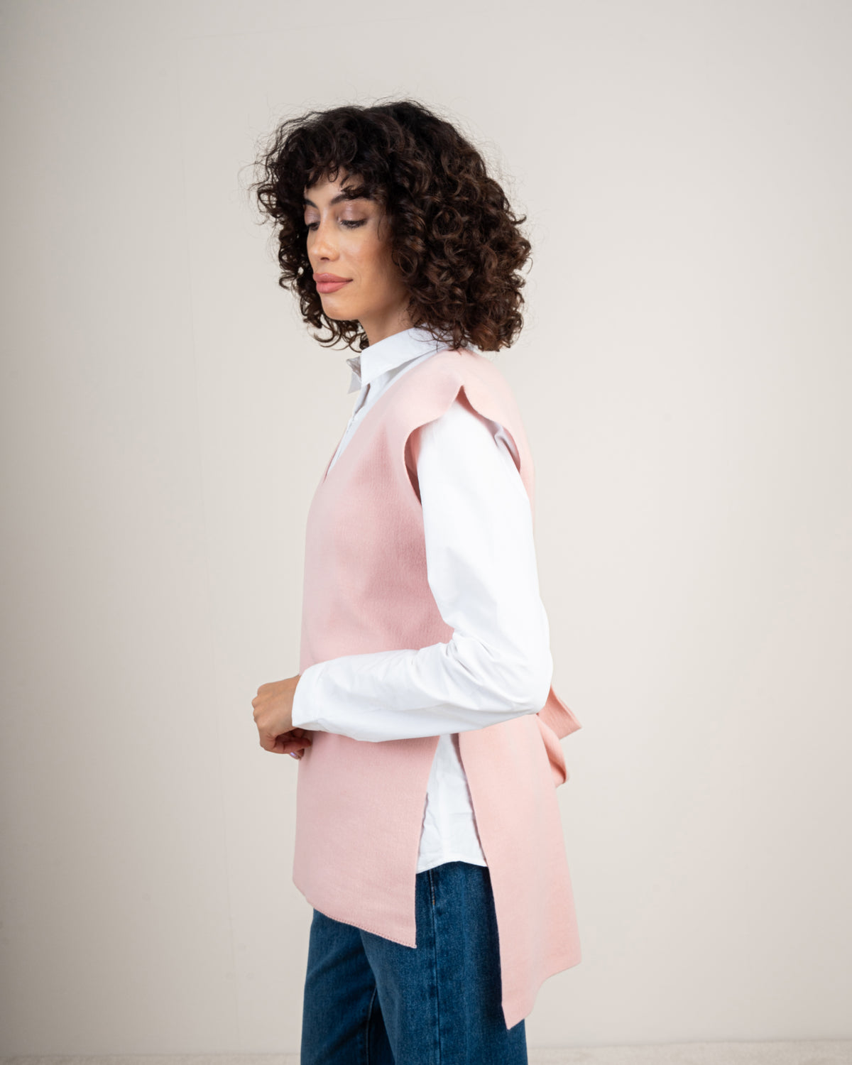 Knit vest with a tie-back detail