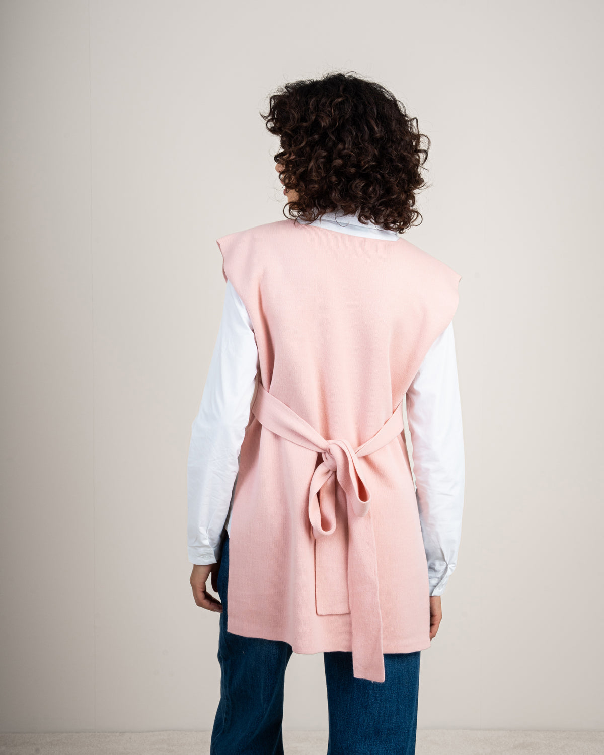 Knit vest with a tie-back detail