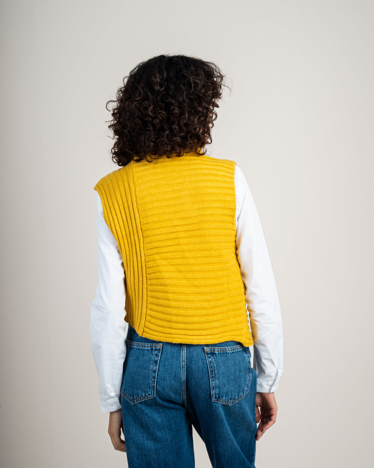 Knitted vest with a neckline