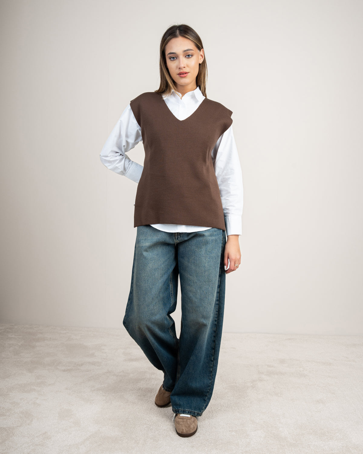 Knit vest with a tie-back detail