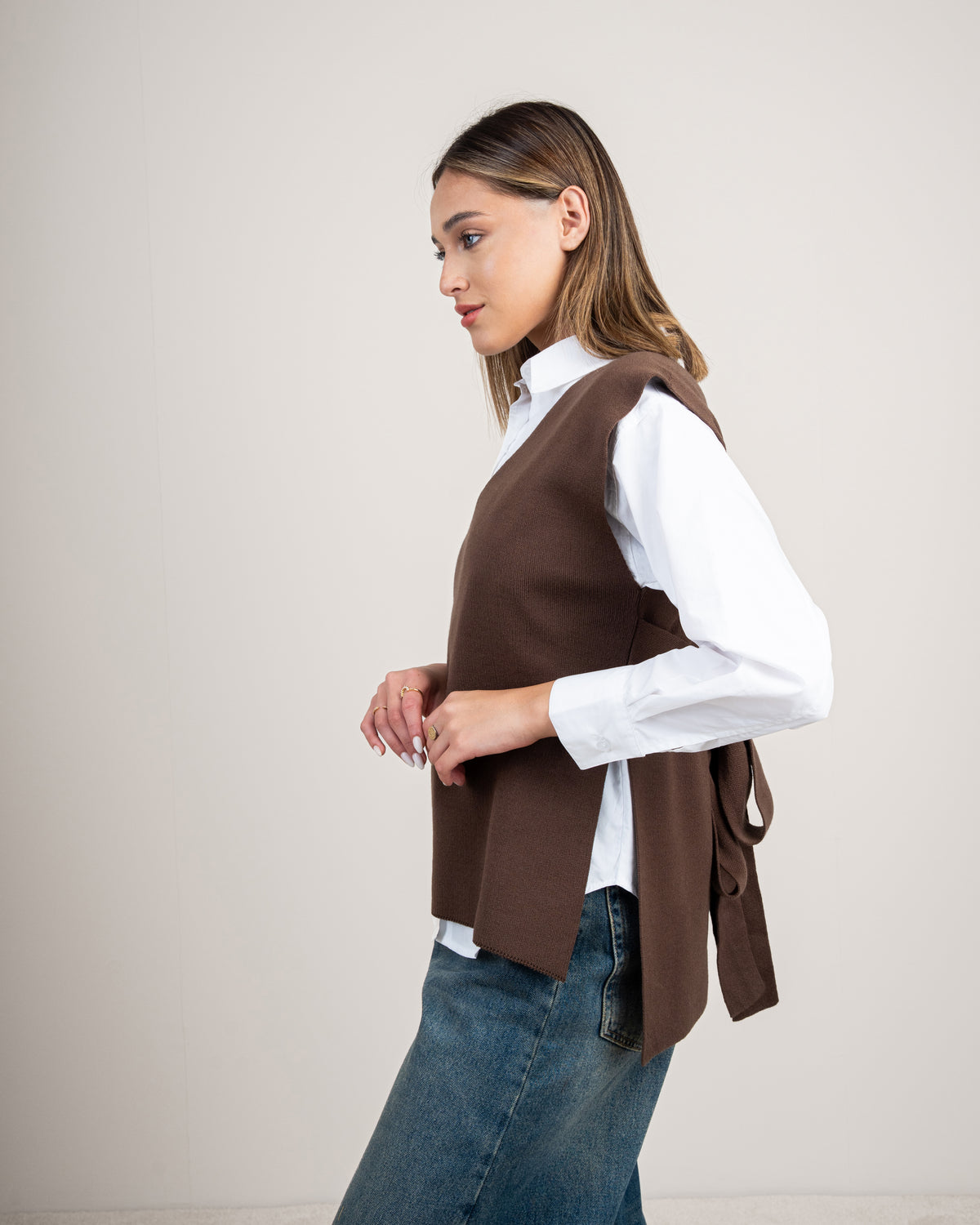Knit vest with a tie-back detail