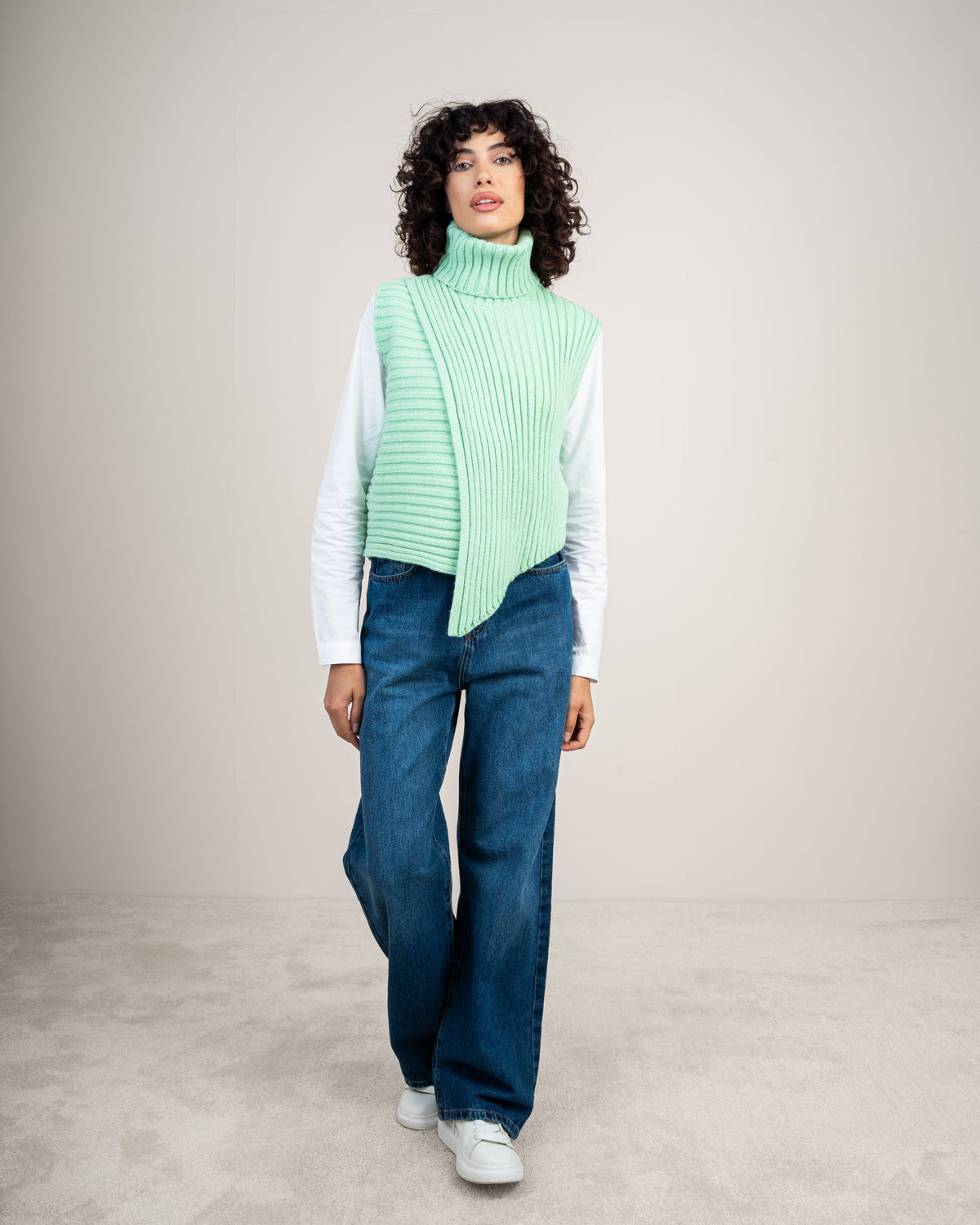 Knitted vest with a neckline