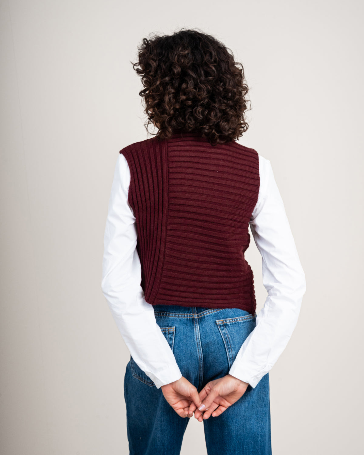 Knitted vest with a neckline