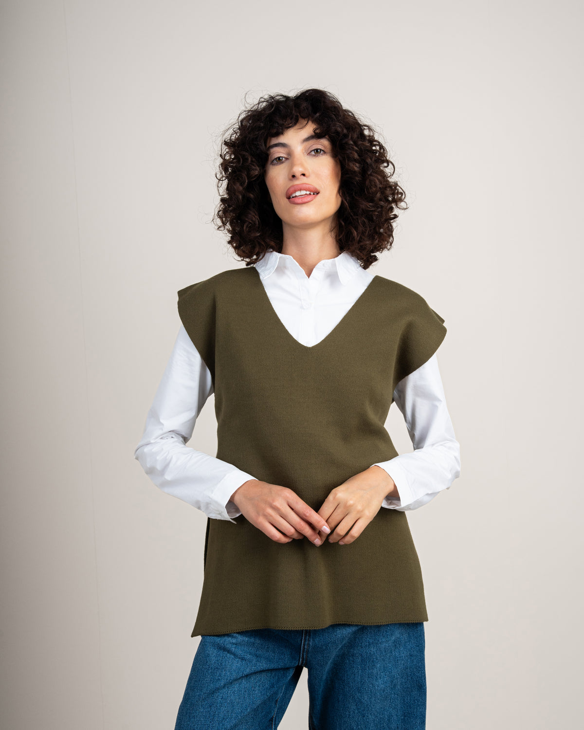 Knit vest with a tie-back detail