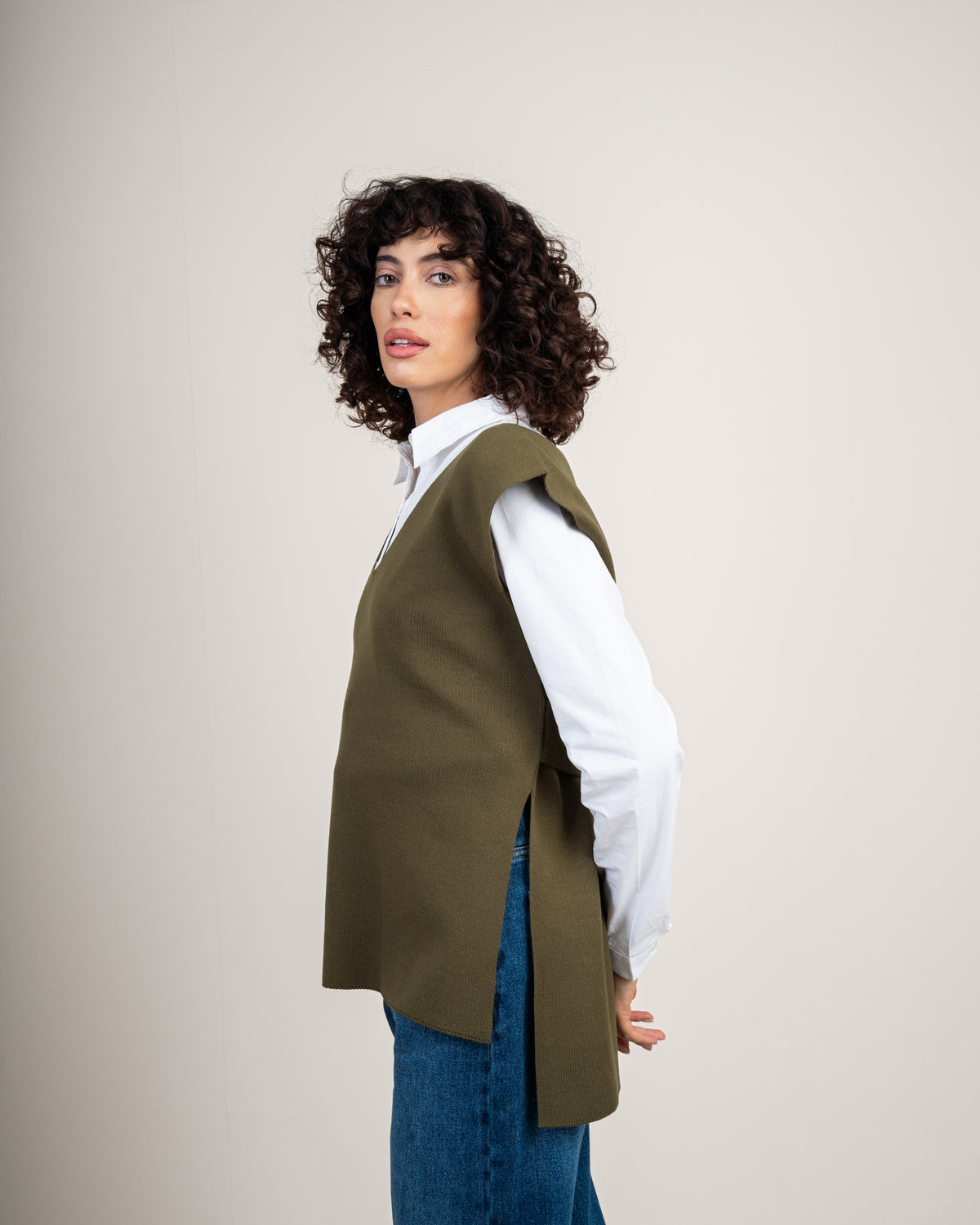 Knit vest with a tie-back detail