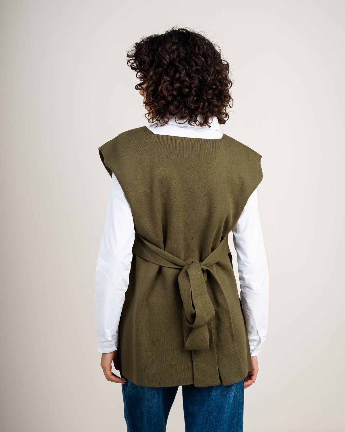 Knit vest with a tie-back detail