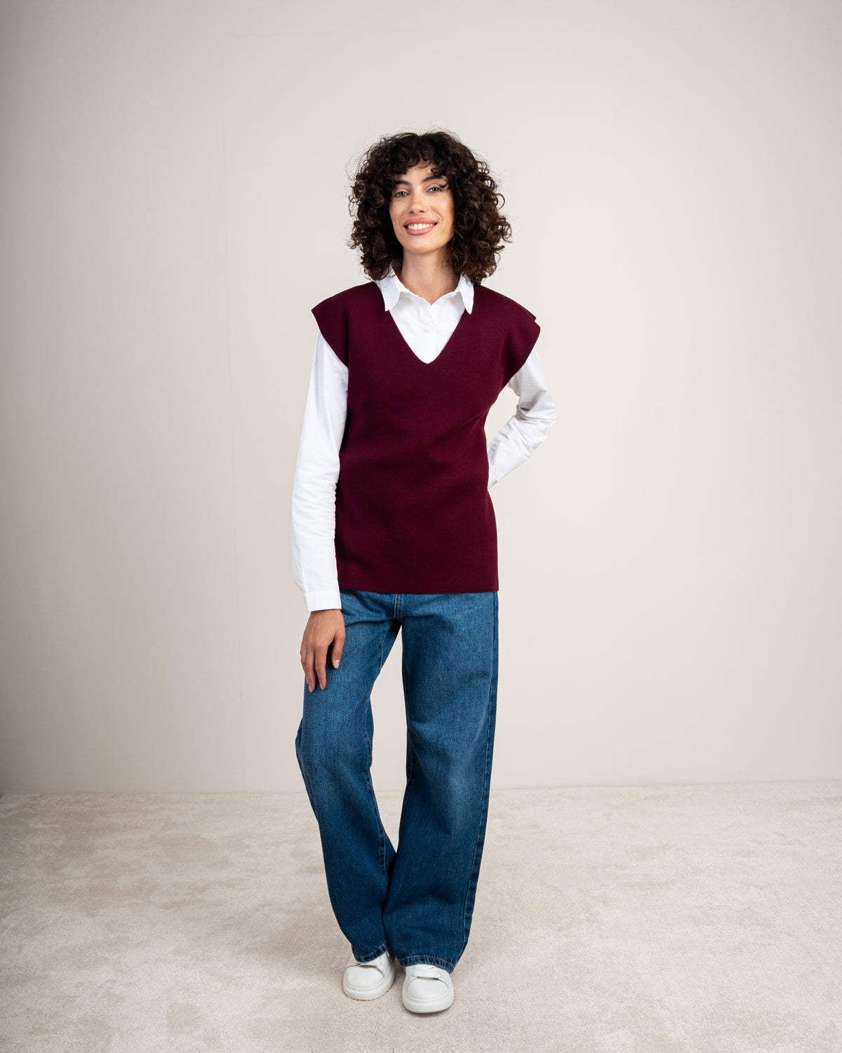 Knit vest with a tie-back detail