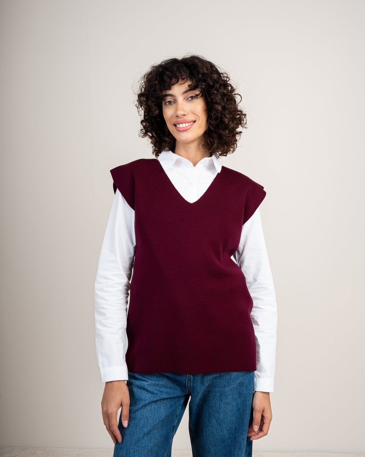 Knit vest with a tie-back detail